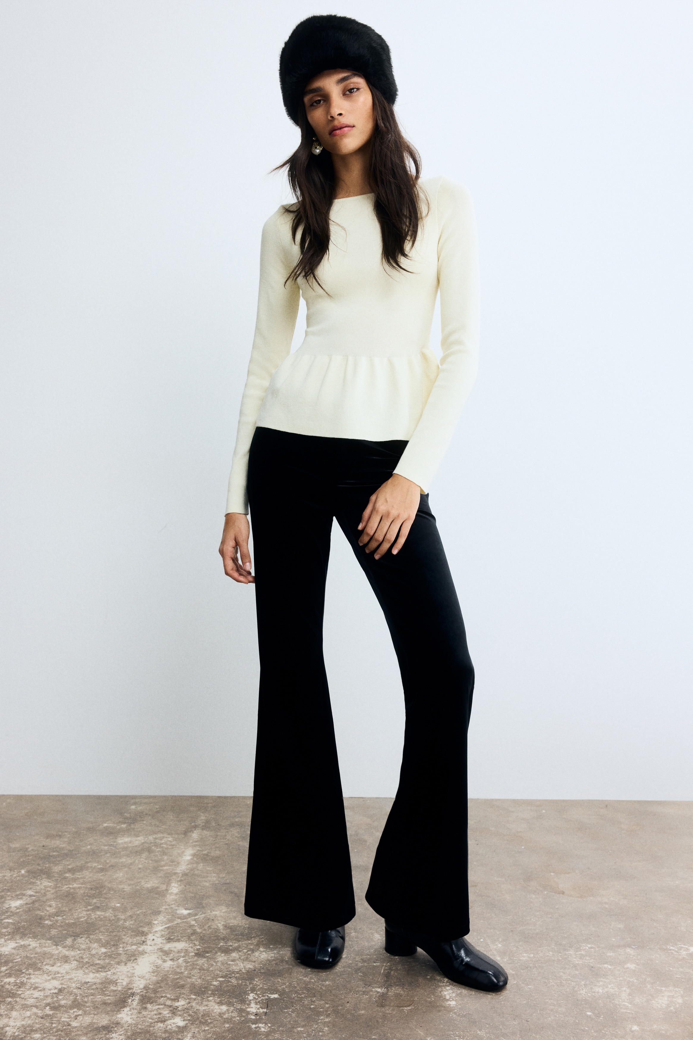 Knitted peplum top