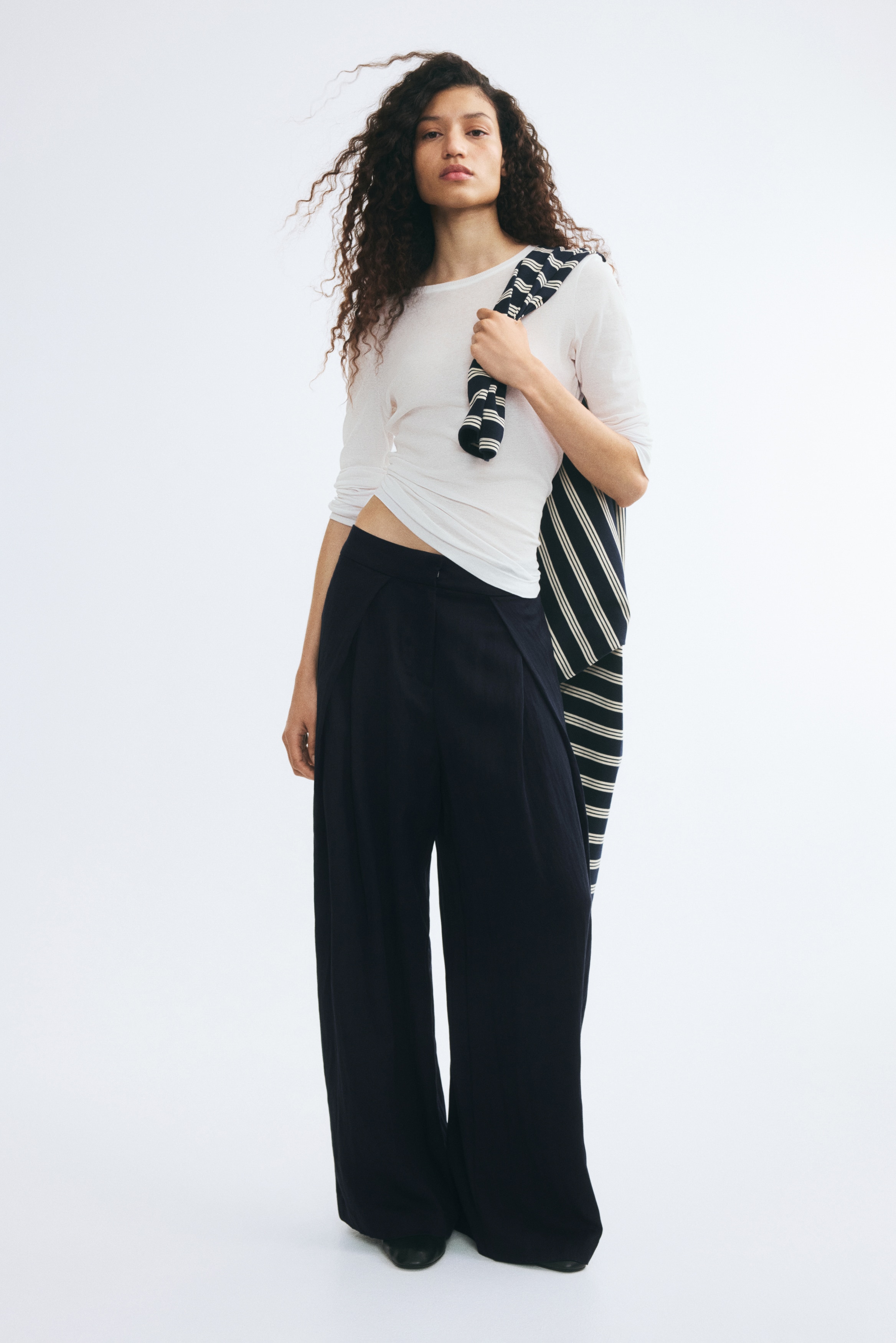 Crinkled wrap-detail trousersModel