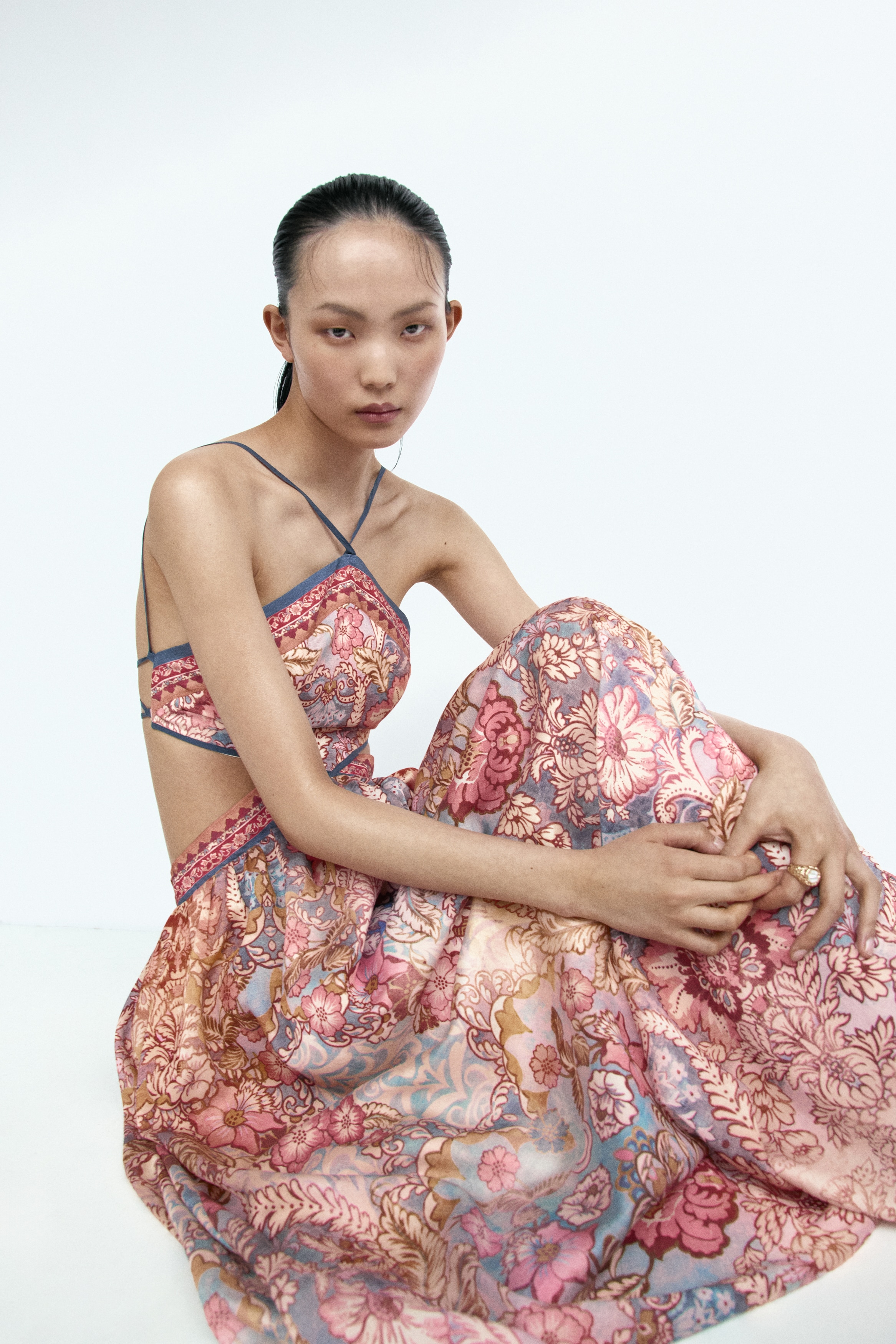 Cut-out halterneck dressModel