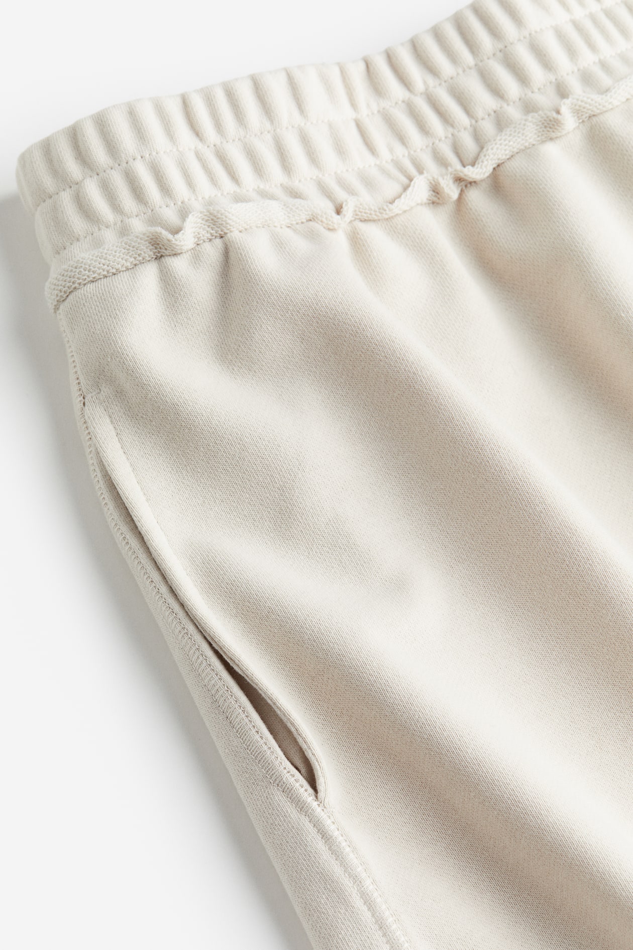 Pull-on Sweatshorts - Regular waist - Short - Light beige - Ladies | H&M US