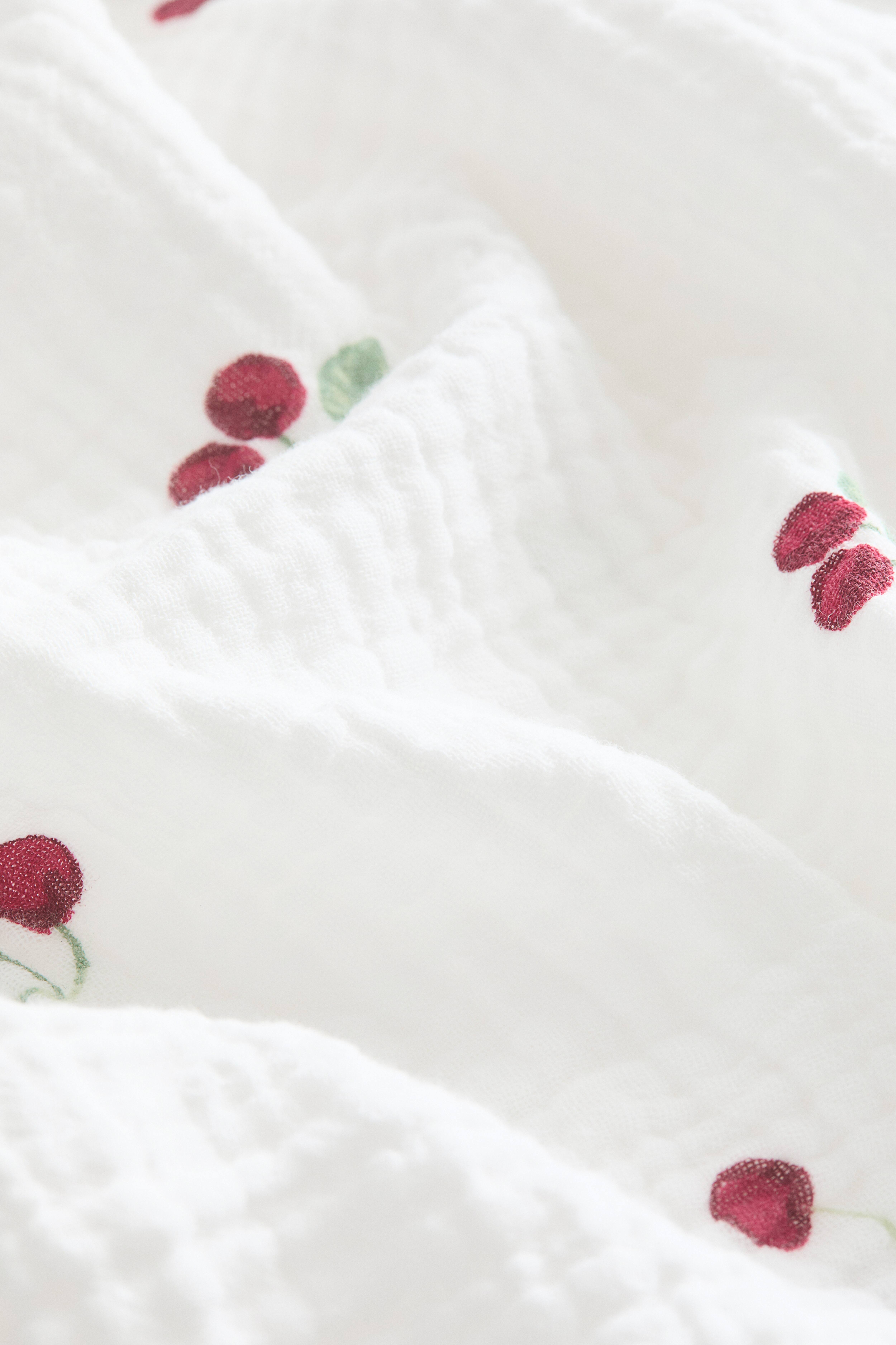 Couverture à motif en mousseline de coton