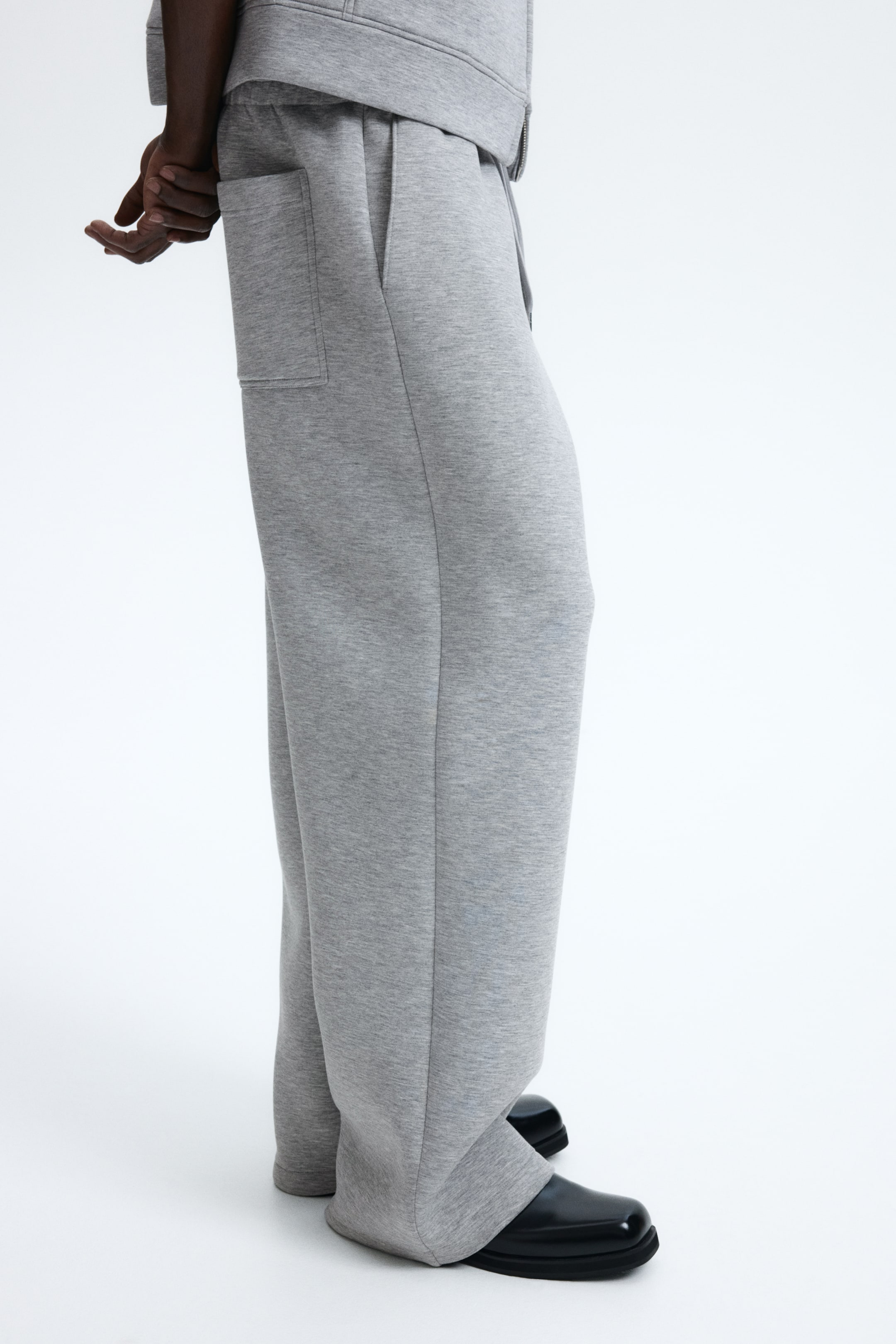 Zobraziť väčší obrázok: Športové nohavice Relaxed Fit - Sivá melírovaná - MUŽI | H&M SK 3