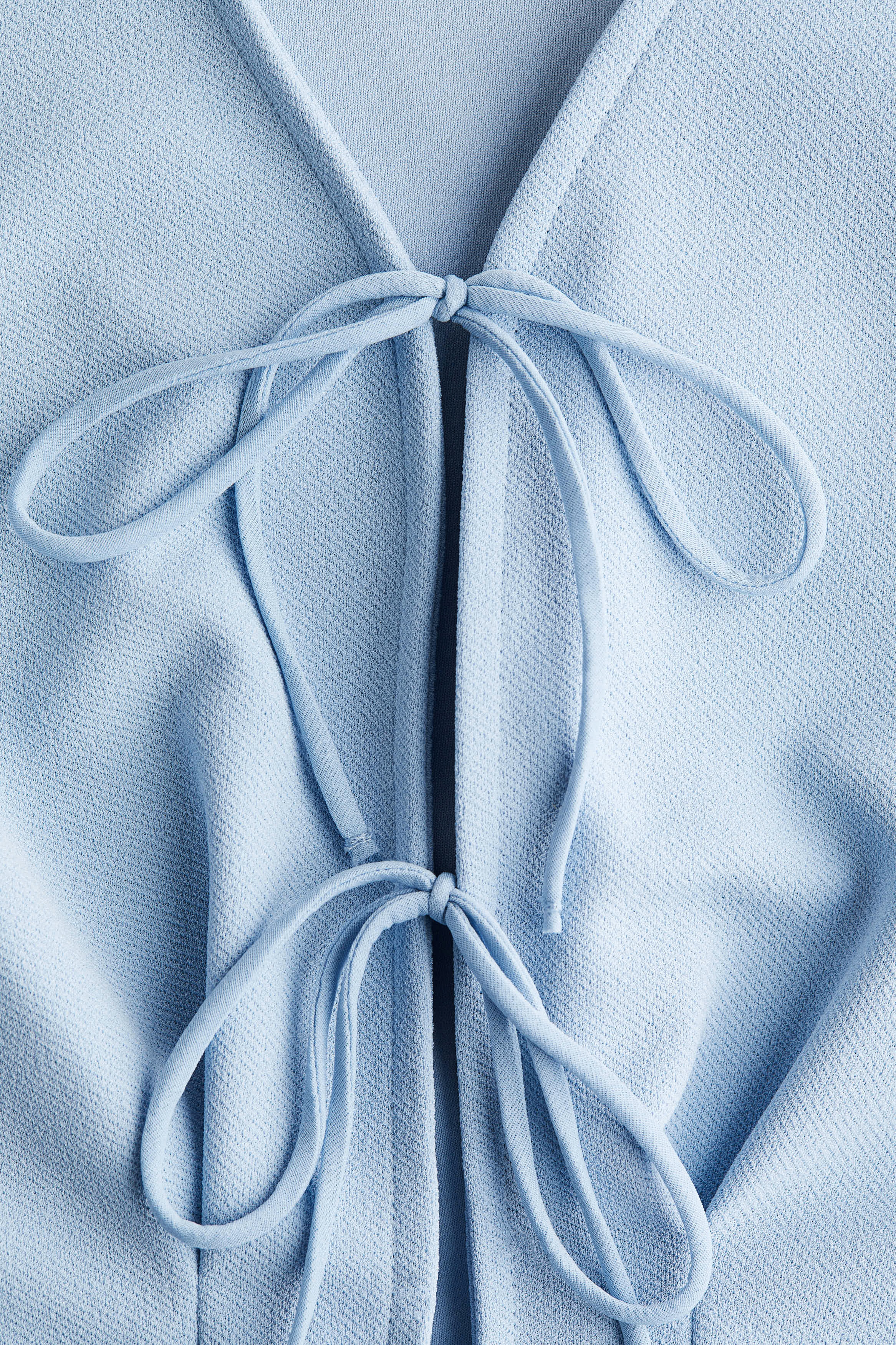 Waisted tie-front top