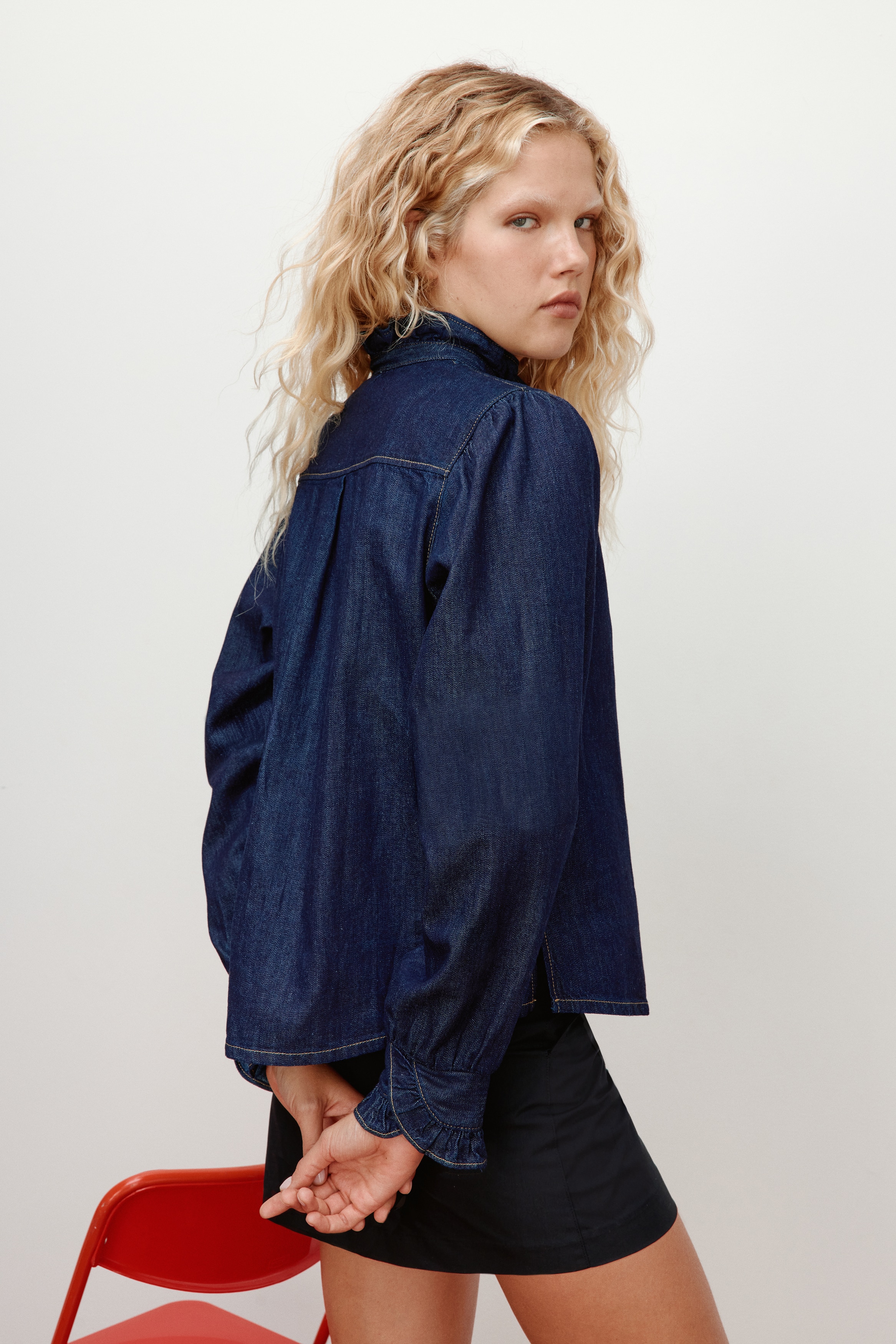 Frill-trimmed denim blouse