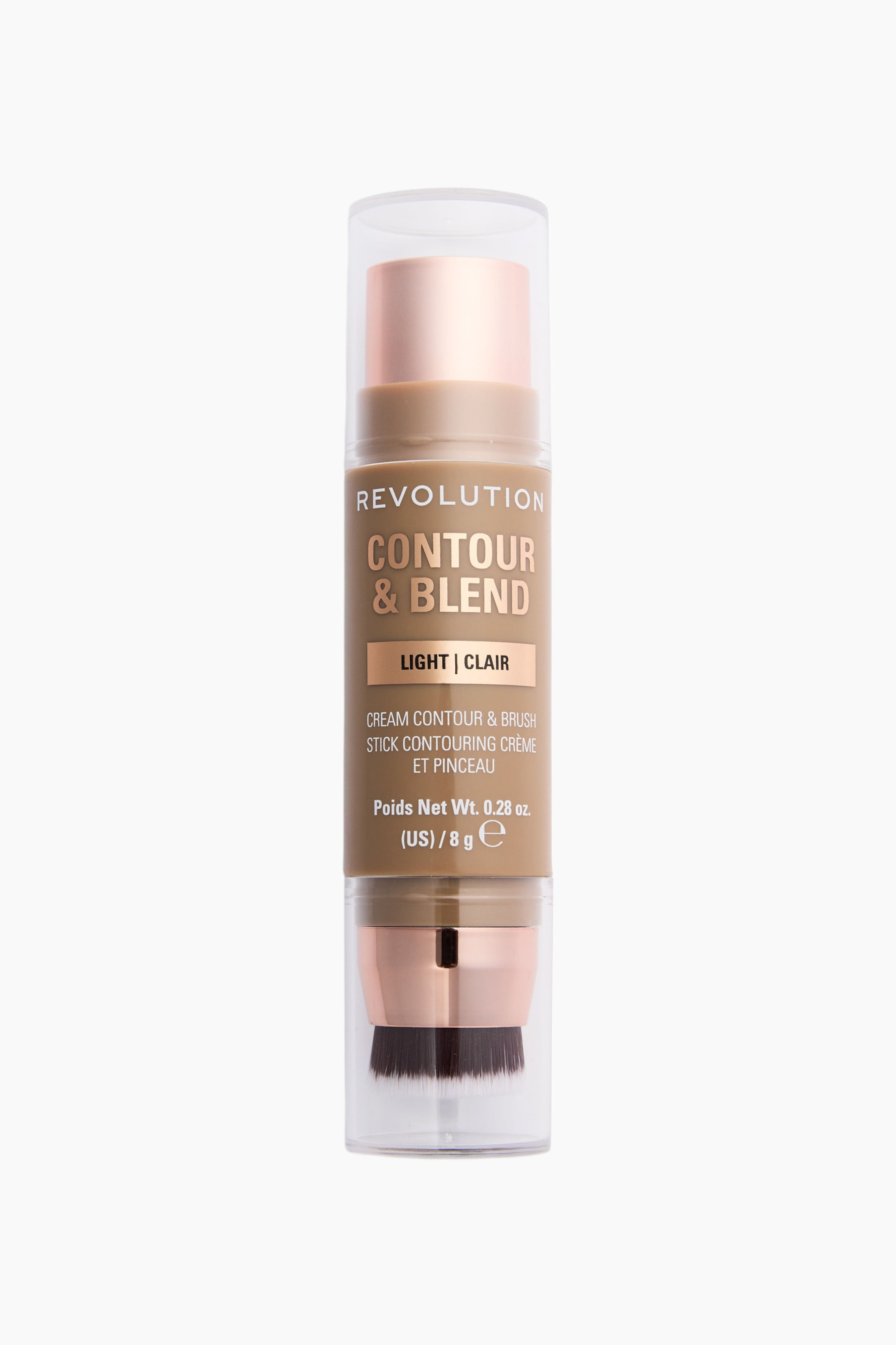 Vis større bilde: En sylinderformet contour- og blend-stick står oppreist og viser en lys tan-farget kropp med detaljer i rosegull. Den har teksten «REVOLUTION CONTOUR & BLEND» og «LIGHT | CLAIR» på forsiden, mens en blendkost med mørke børster er synlig integrert i bunnen.