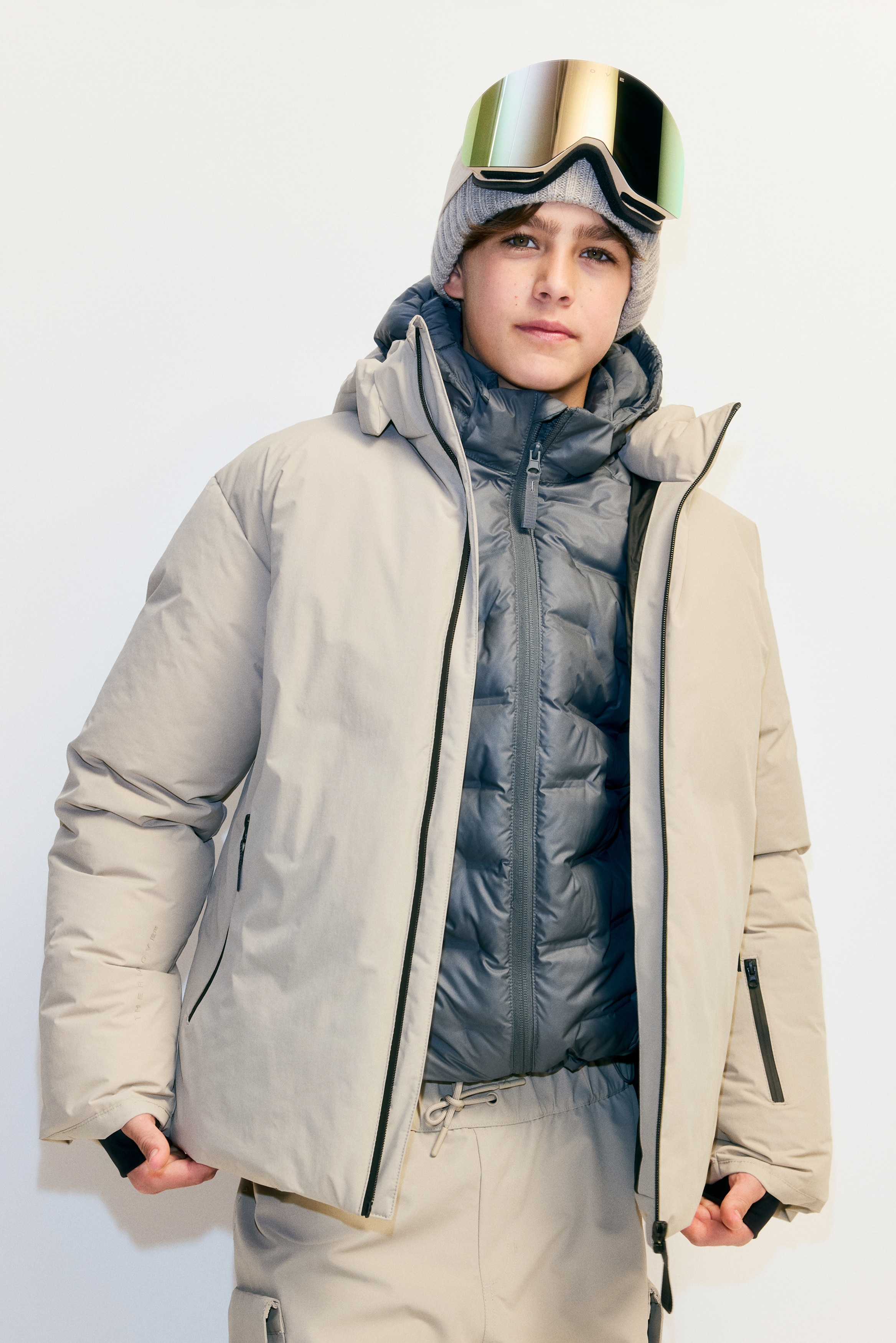 ThermoMove™鋪棉運動外套 - 淺米色/黑色