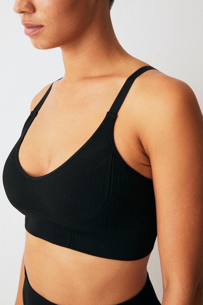 DryMove™ Medium Support Sports bra - Black/Light teal/Dark brown - 4