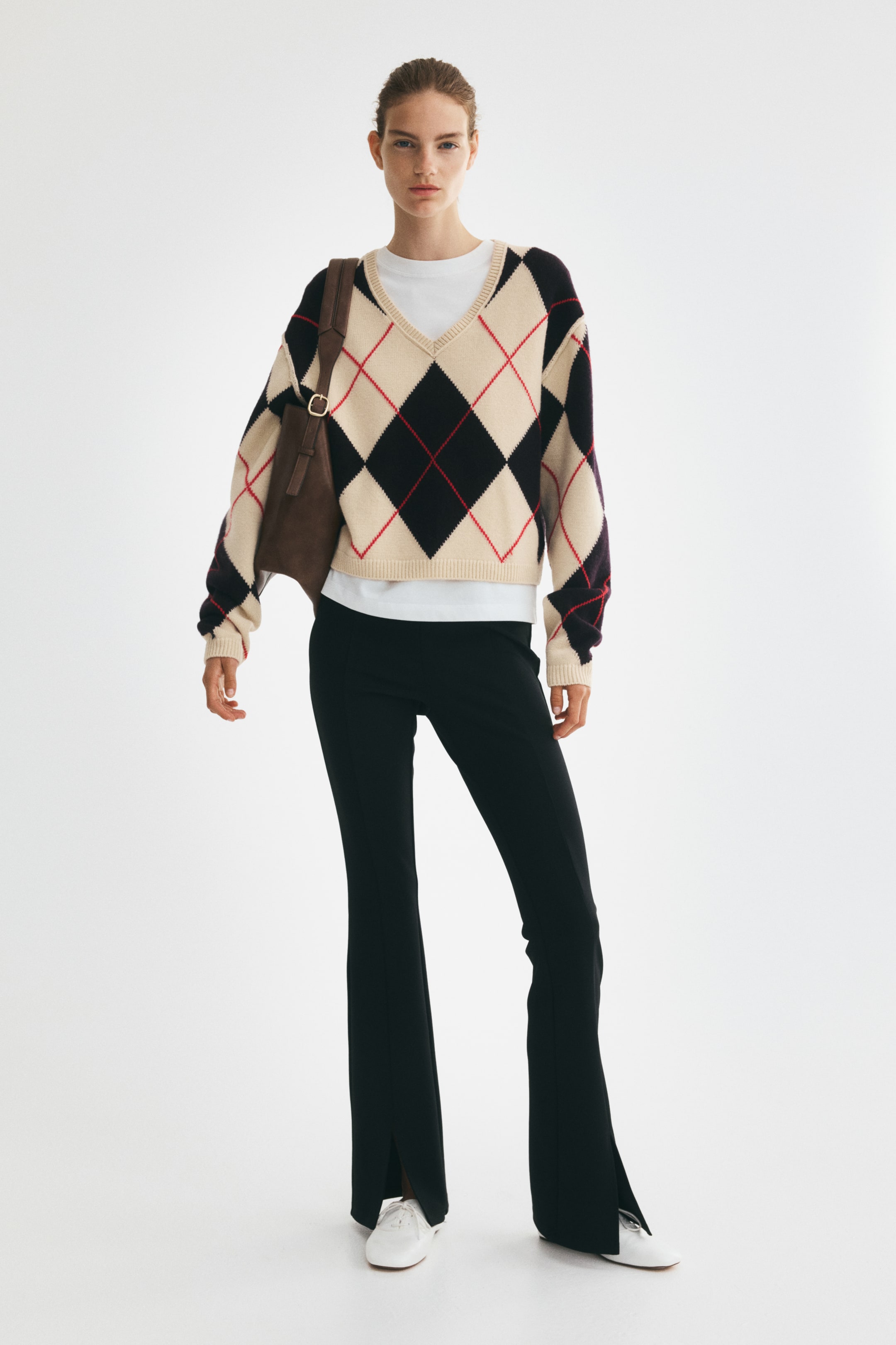 Visa större bild: Utsvängda leggings med pressveck - Svart - DAM | H&M FI 1
