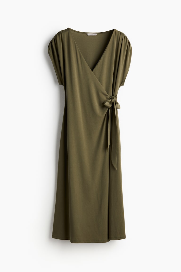 slim fit dress slacks Naomi Olive Long Sleeve Jumpsuit  Elizabeth's Boutique
