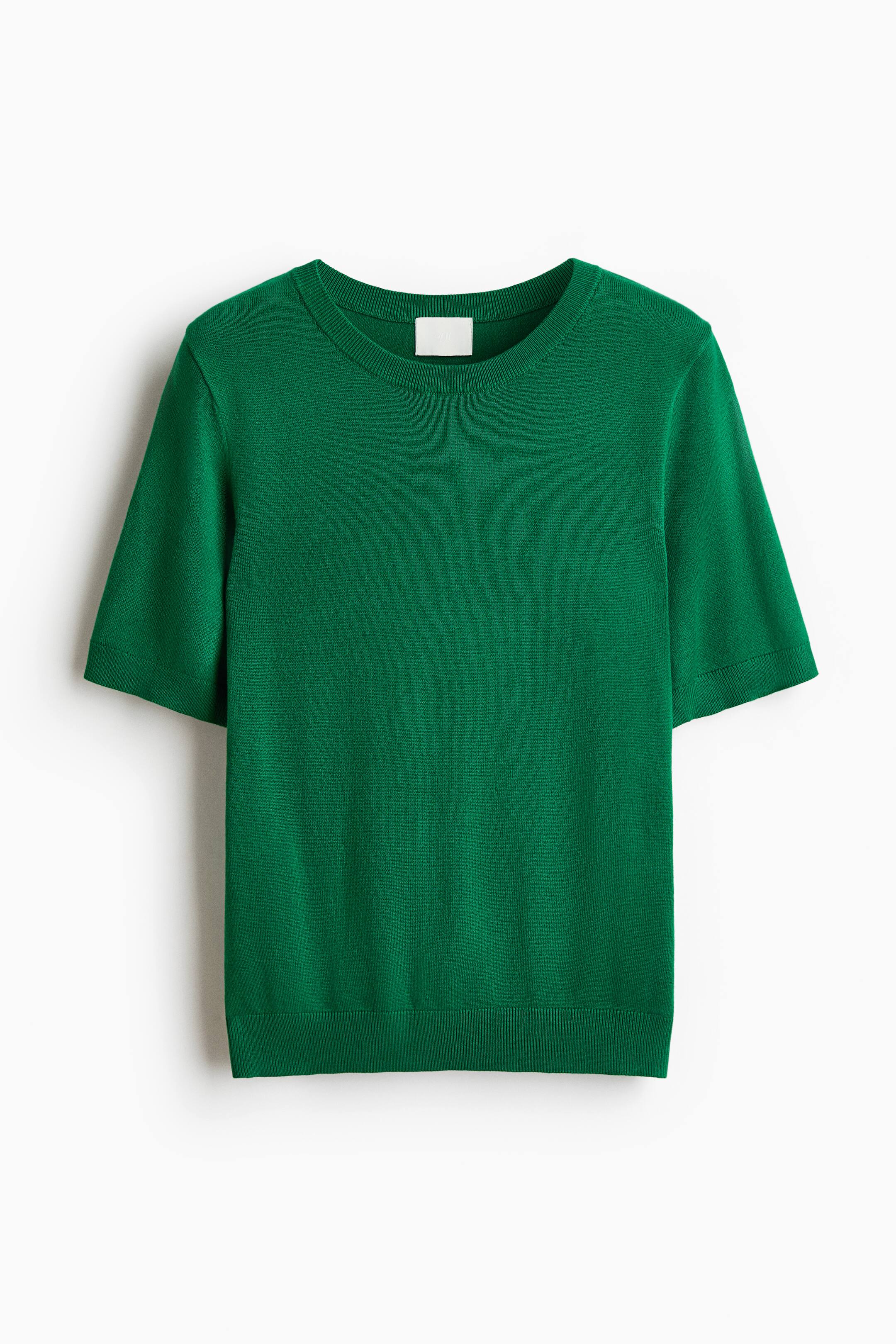 View larger image: A green, fine-knit, short-sleeve top is shown from the front, featuring a ribbed crew neckline, ribbed cuffs, and a ribbed hem.