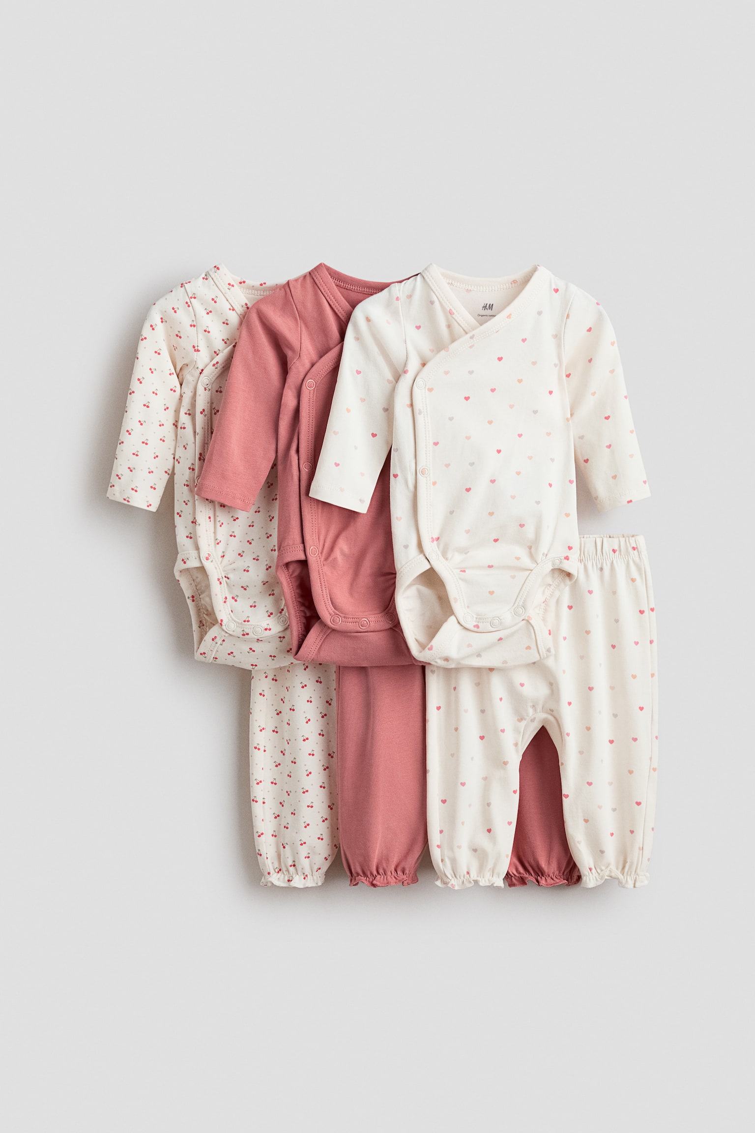 Zesdelige set - Rompers en broeken - Dusty roze/kersen/Lichtgroen/dieren/Lichttaupe/lichtbeige/Taupe/wit/Dusty roze/bloemen/Marineblauw/dieren/Dusty lichtroze/bloemen