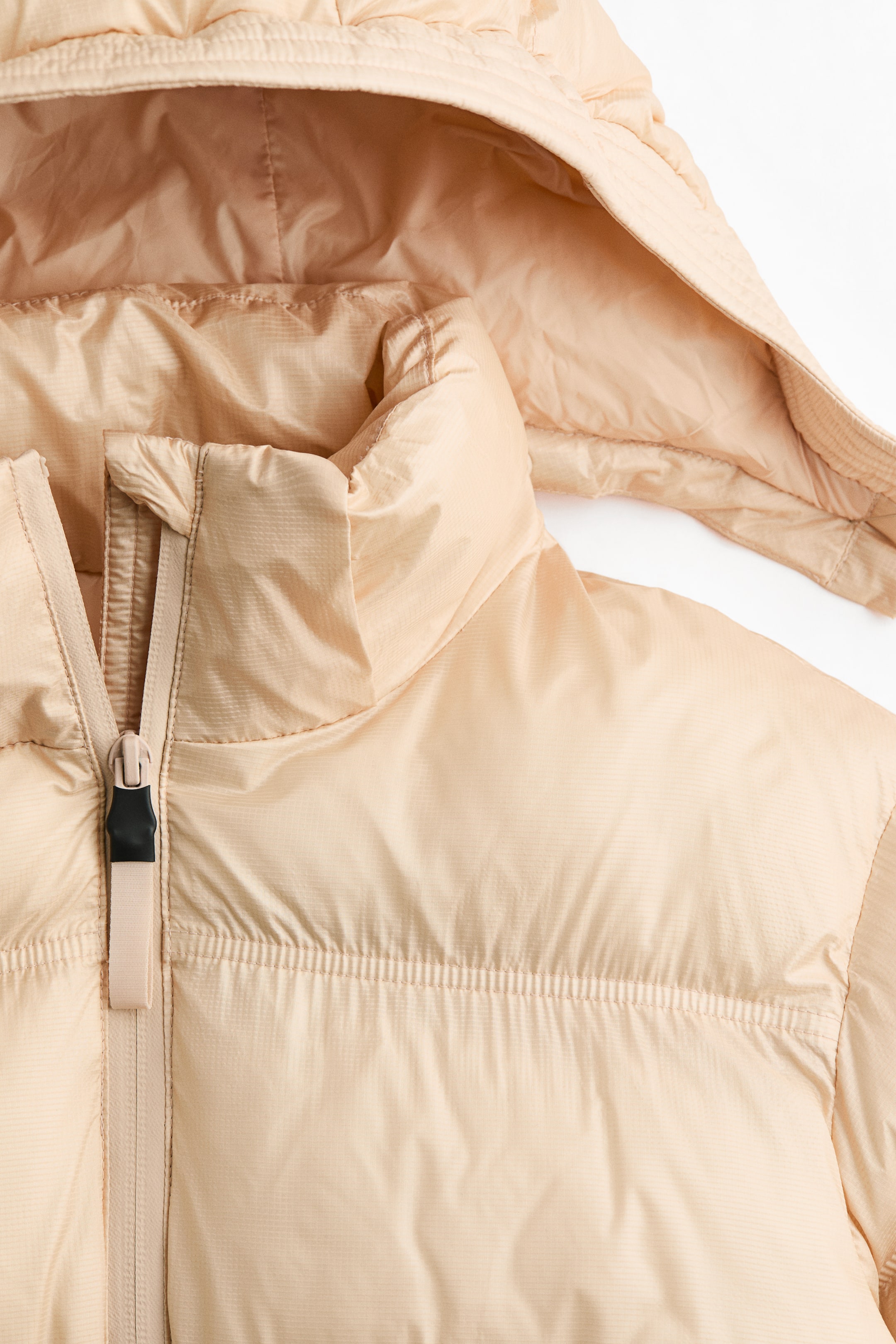 Ampliar la imagen: Chamarra puffer con ThermoMove™ - Beige - Kids | H&M MX 5