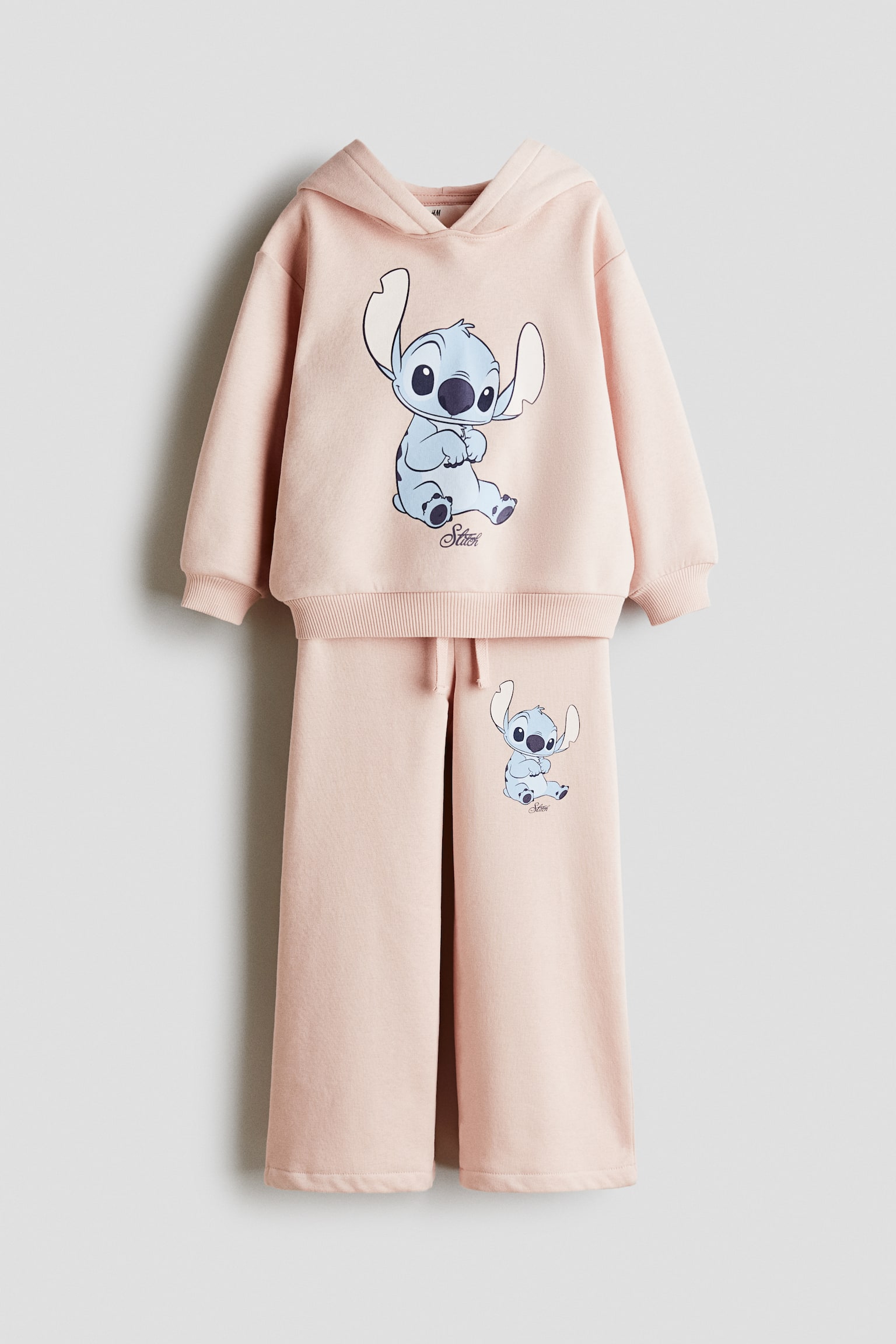 Детский комплект H&M 2-Piece Printed Sweatshirt and Joggers Set, цвет: Розовый — фото 1