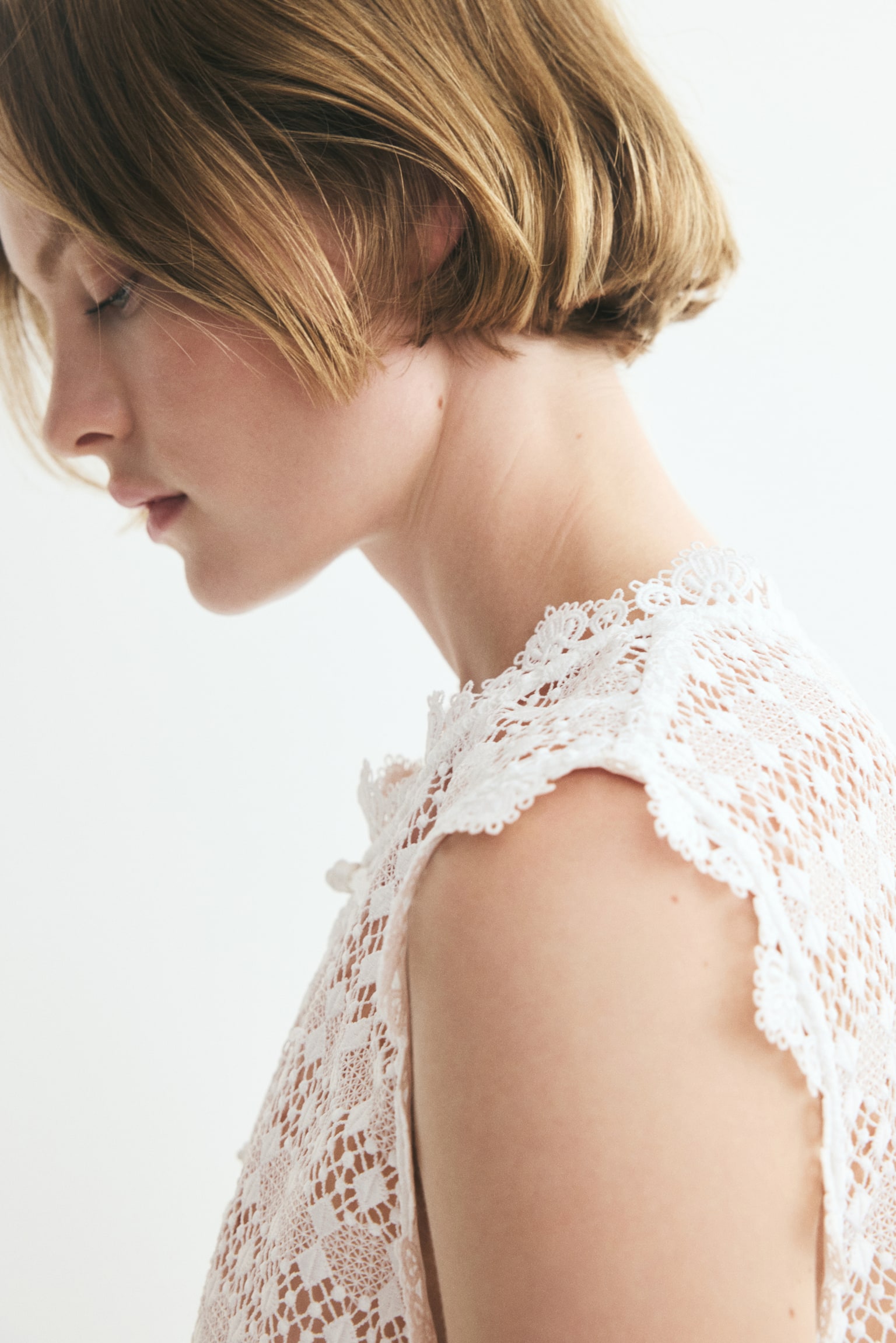 Blusa em renda com botões de nó - Branco - 1