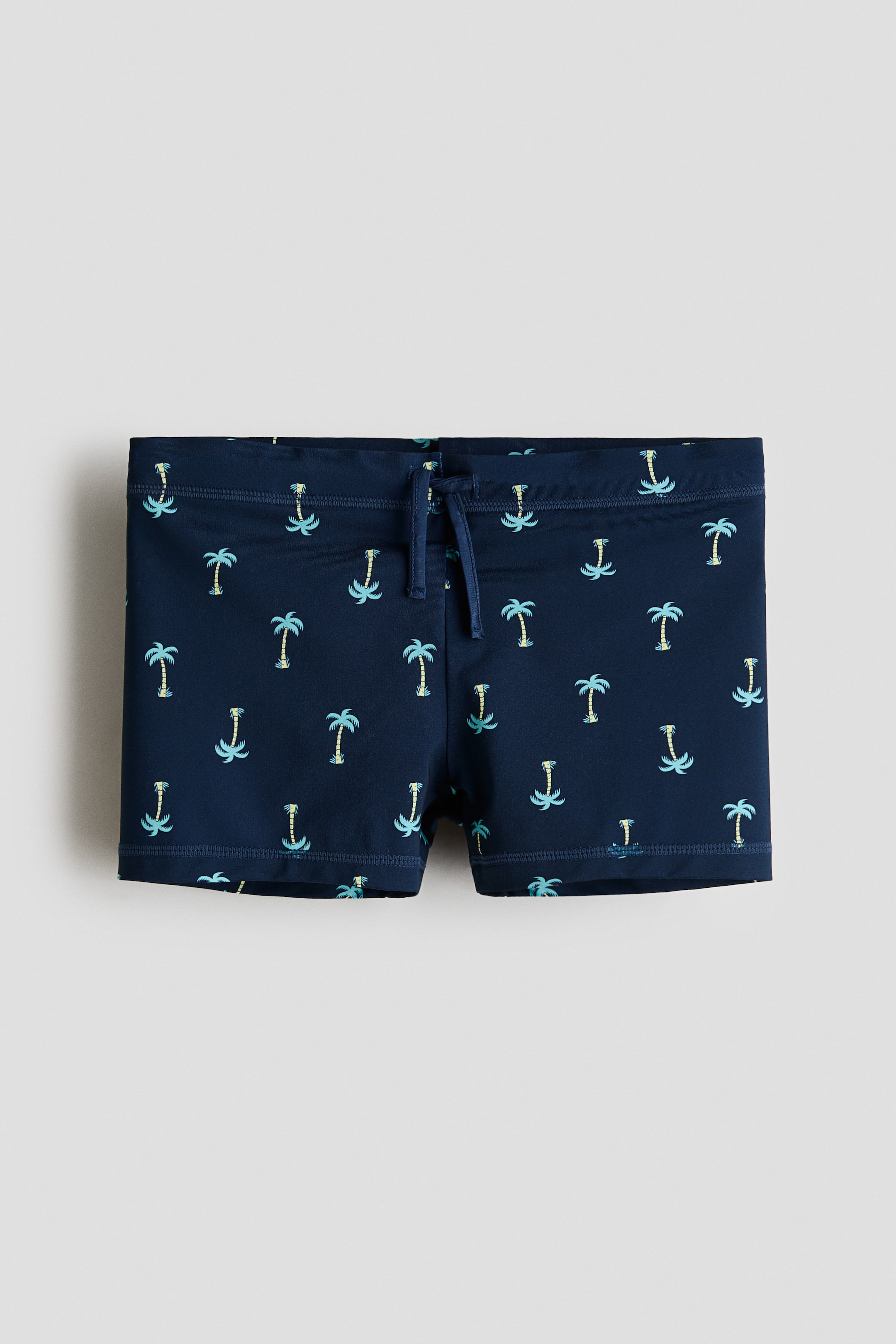 View larger image: Swimming trunks - Navy blue/Palm trees - Kids | H&M 1