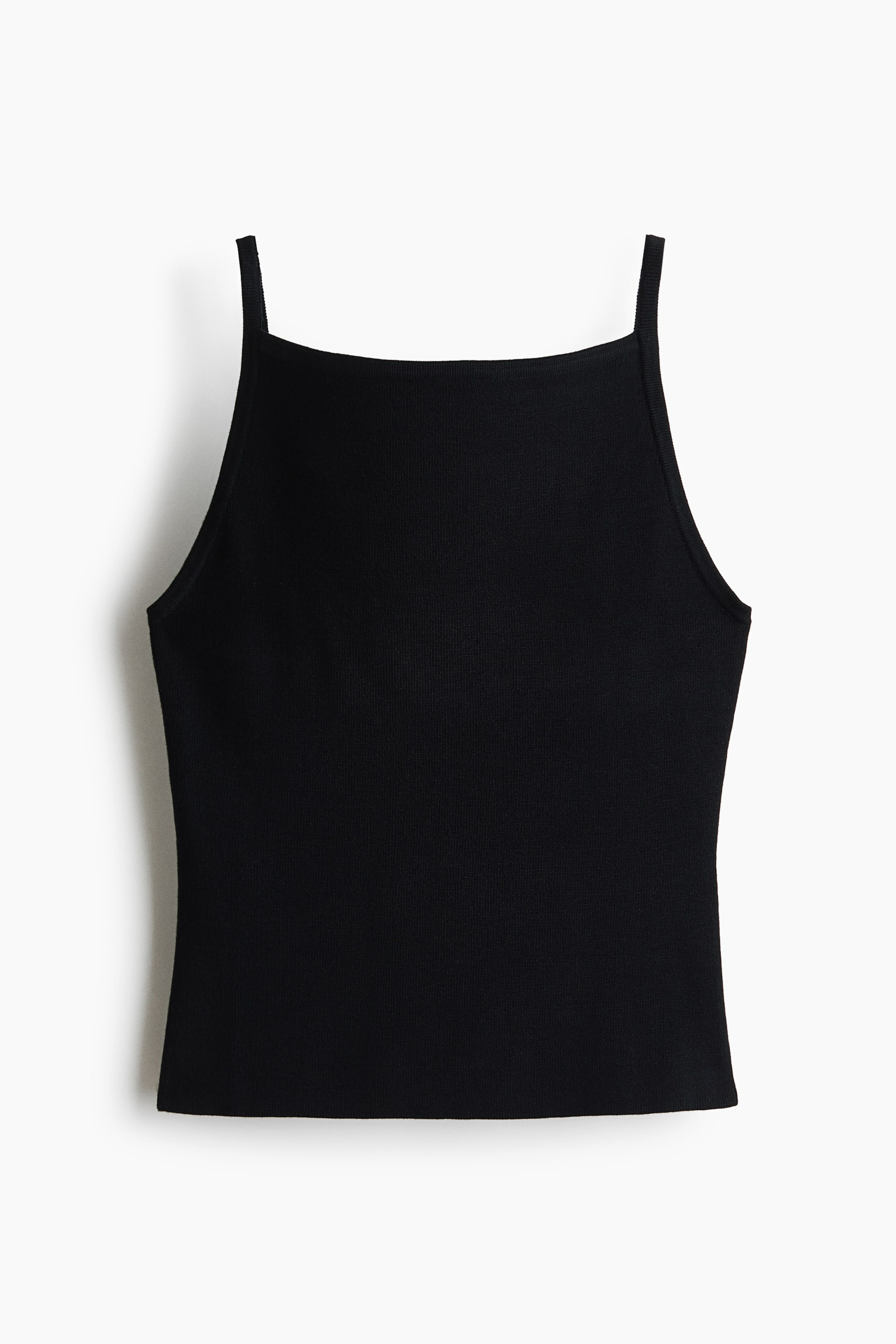 Ver imagen más grande: Una camiseta de punto acanalado negra muestra un escote alto y recto y finos tirantes spaghetti, presentando su vista frontal.