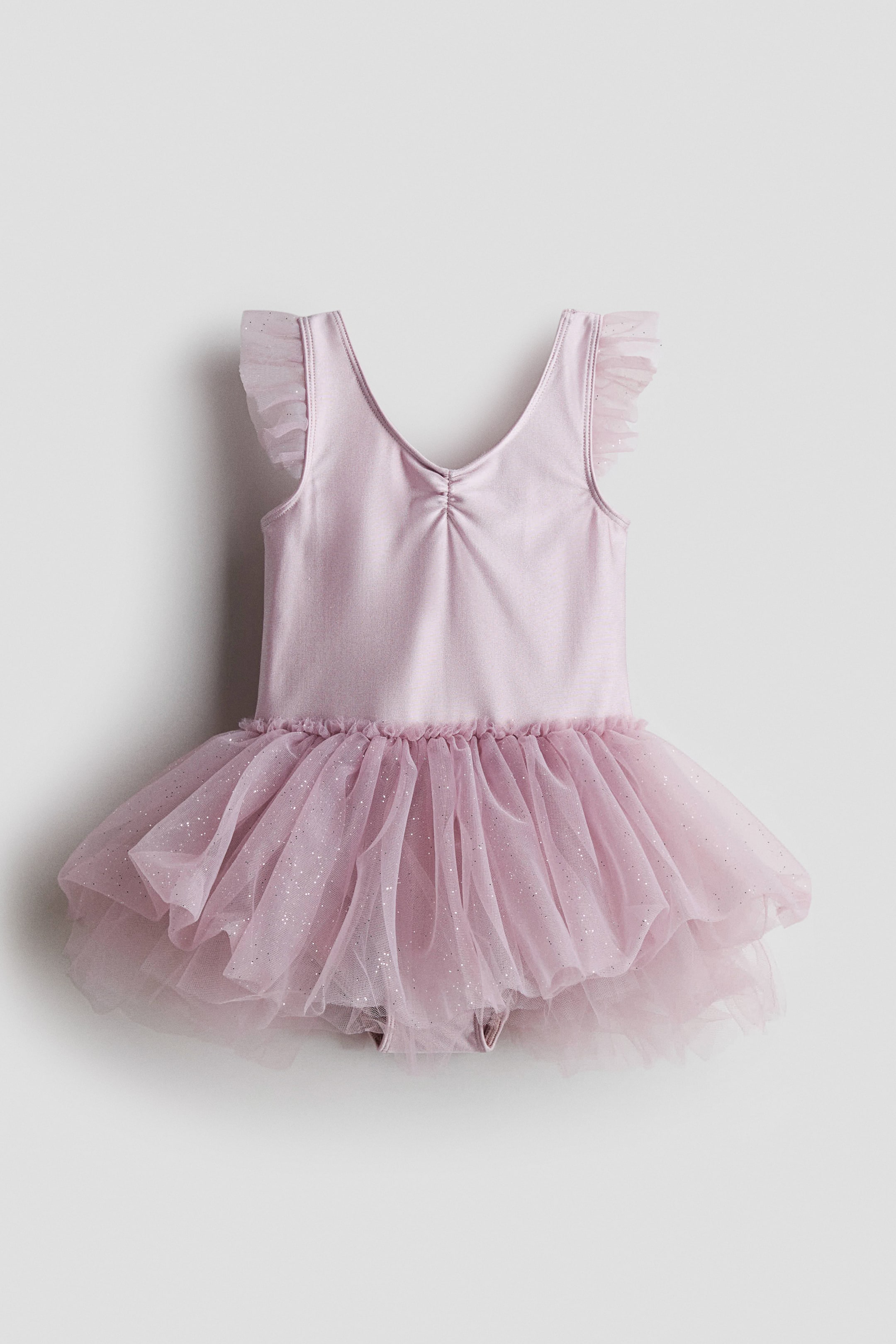 Ampliar la imagen: Leotardo con falda de tul - Rosa tenue claro/Brillos - Kids | H&M MX 1