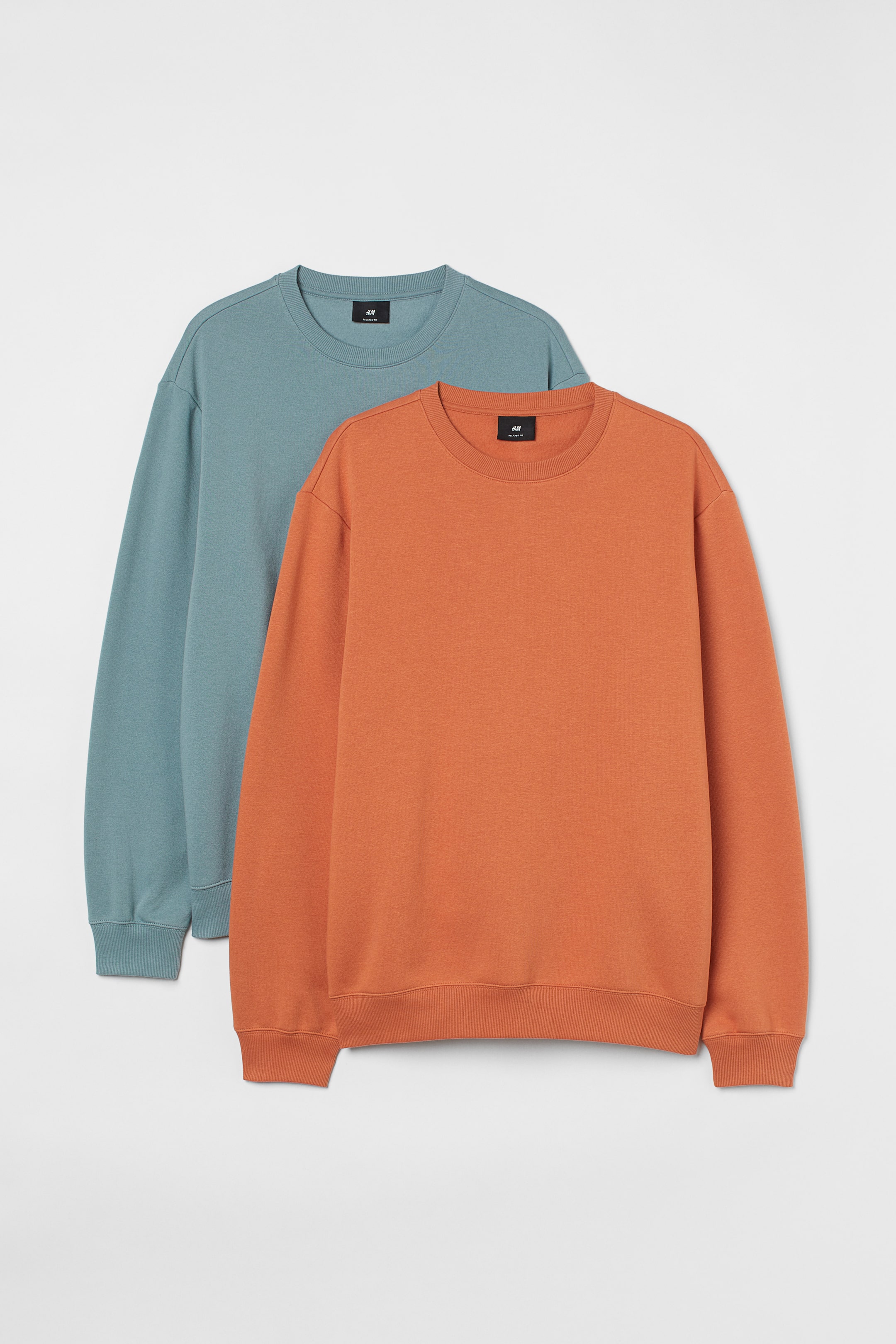 View larger image: 2-pack Loose Fit sweatshirts - Turquoise/Orange - Men | H&M IN 1