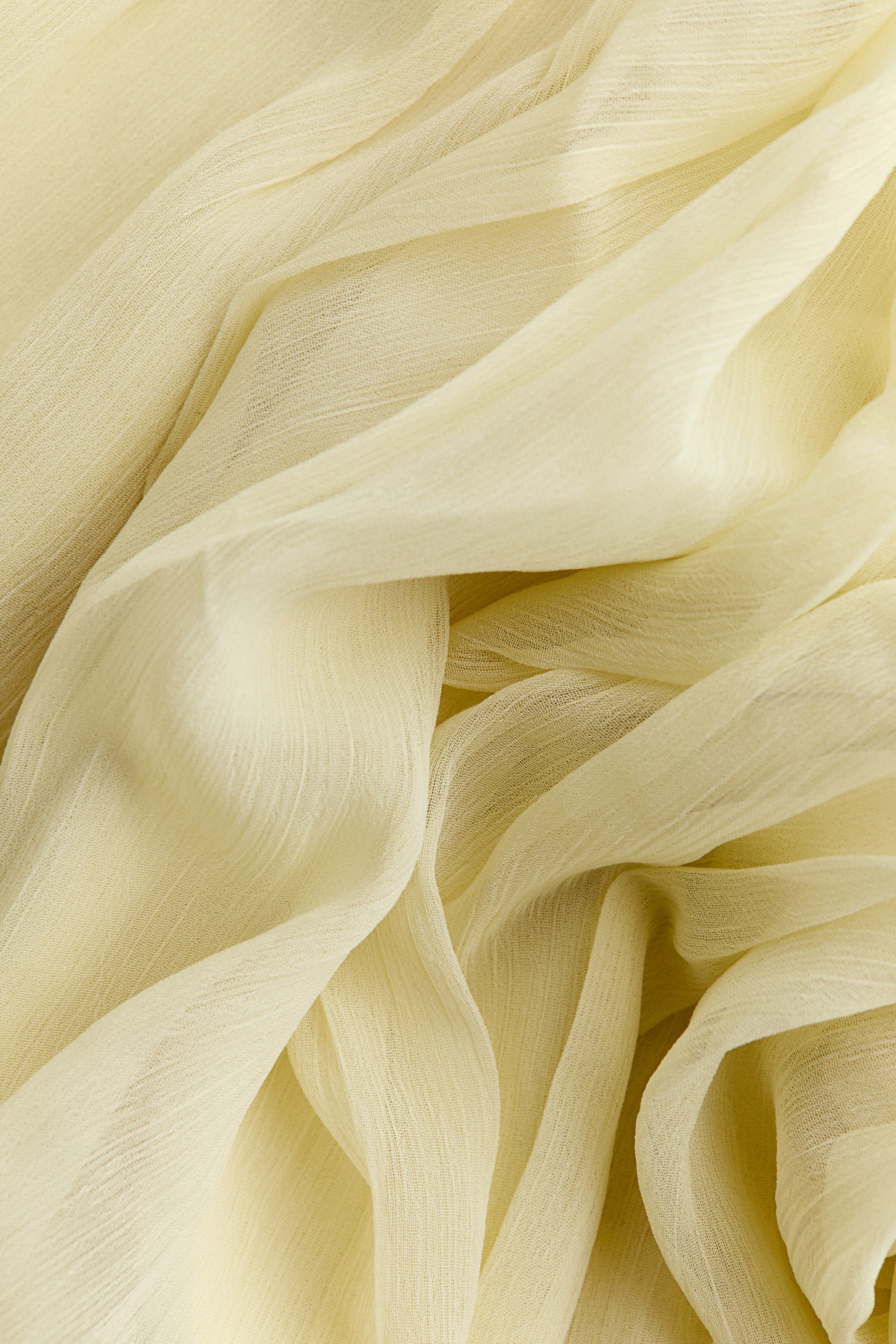 Robe en mousseline à effet drapé