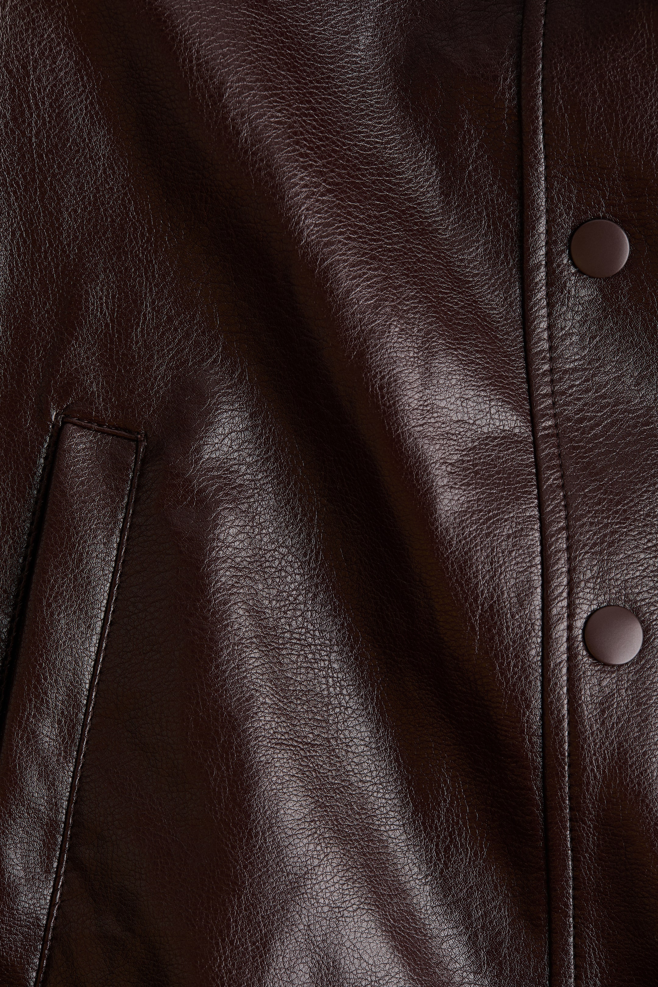 Veste croisée en tissu enduit