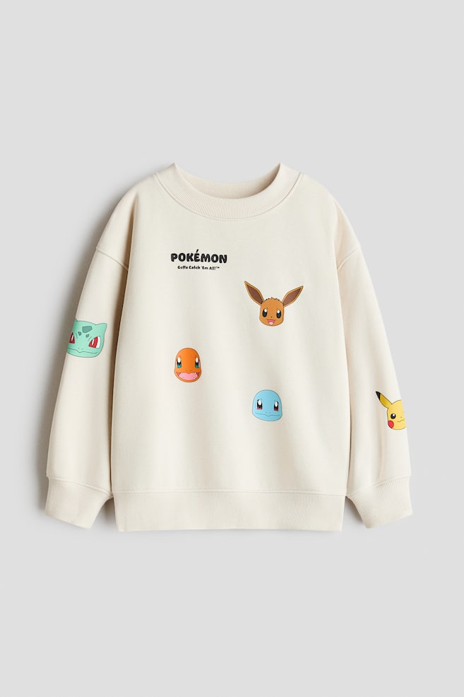 Sweatshirt estampada com o interior cardado - Creme/Pokémon/Azul marinho/Marvel Comics/Vermelho escuro/Homem-Aranha/Turquesa escuro/Carros/Verde escuro/Minecraft/Castanho escuro/Snoopy - 1