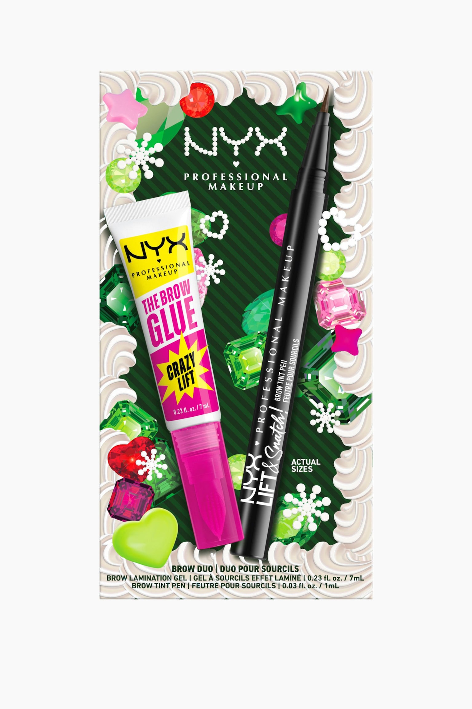 FÃ¶rpackningen av Bling The Halls Brow Glue Duo 02 sedd framifrÃ¥n visar en vit klÃ¤mstub med "The Brow Glue" och ett genomskinligt rosa lock, tillsammans med en svart "Lift & Snatch!" brynfÃ¤rgspenna med sin fina borstspets exponerad. Produkterna visas mot en festlig grÃ¶n bakgrund dekorerad med fÃ¤rgstarka illustrerade Ã¤delstenar, snÃ¶flingor och en vit kant som liknar glasyr.