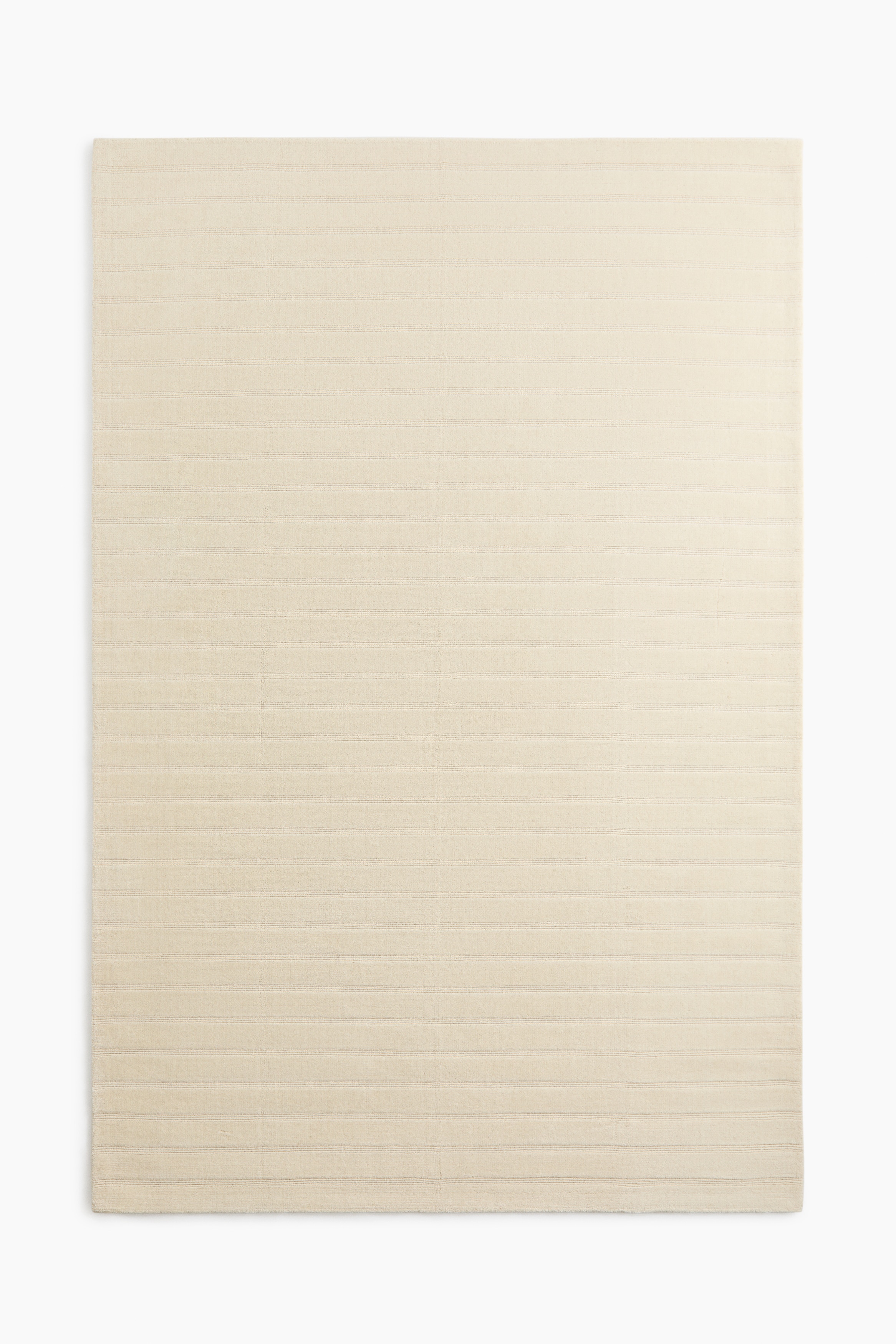 Large handwoven wool-blend rugModel