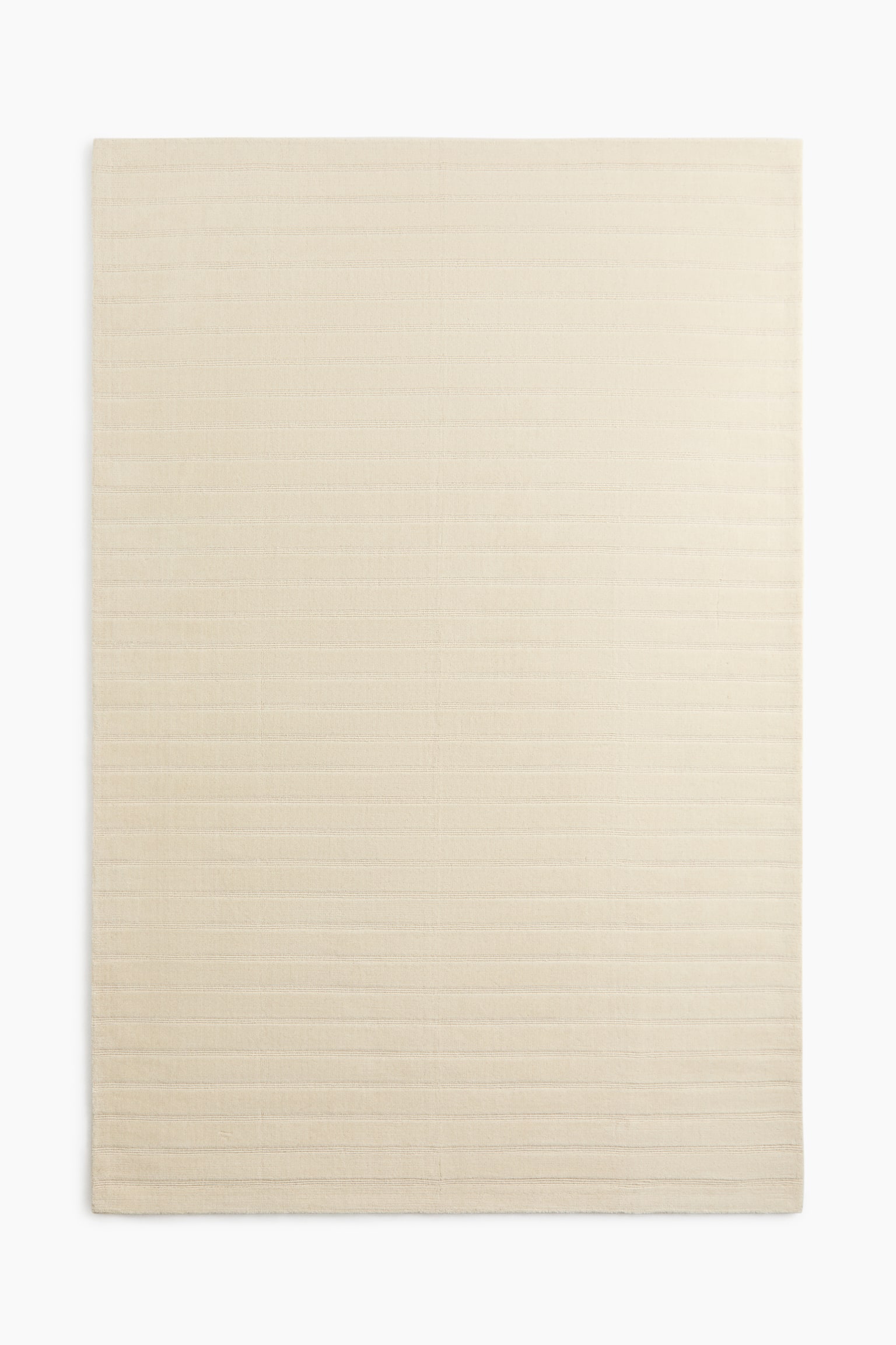 Large handwoven wool-blend rug - Light beige