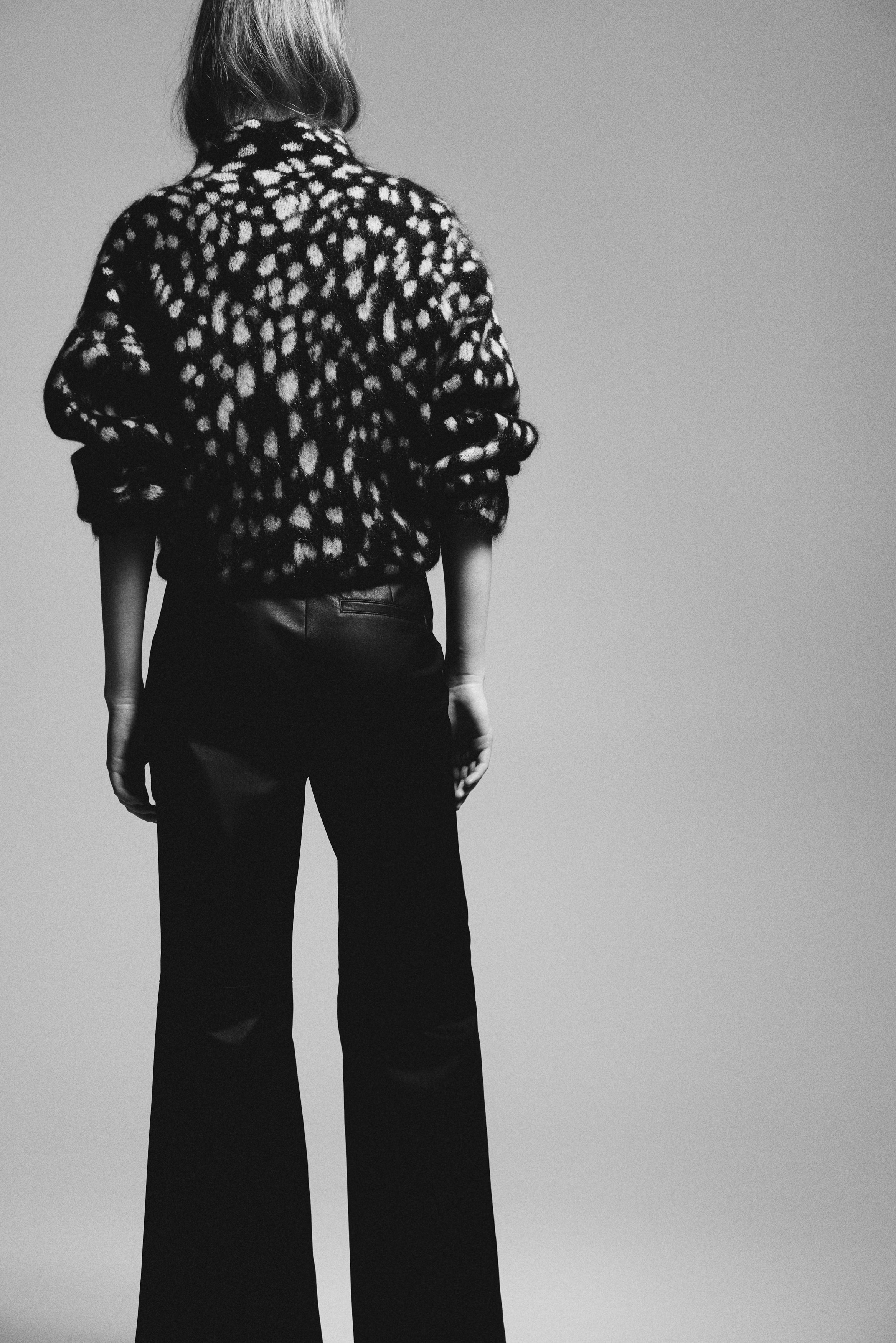 Flared coated trousers