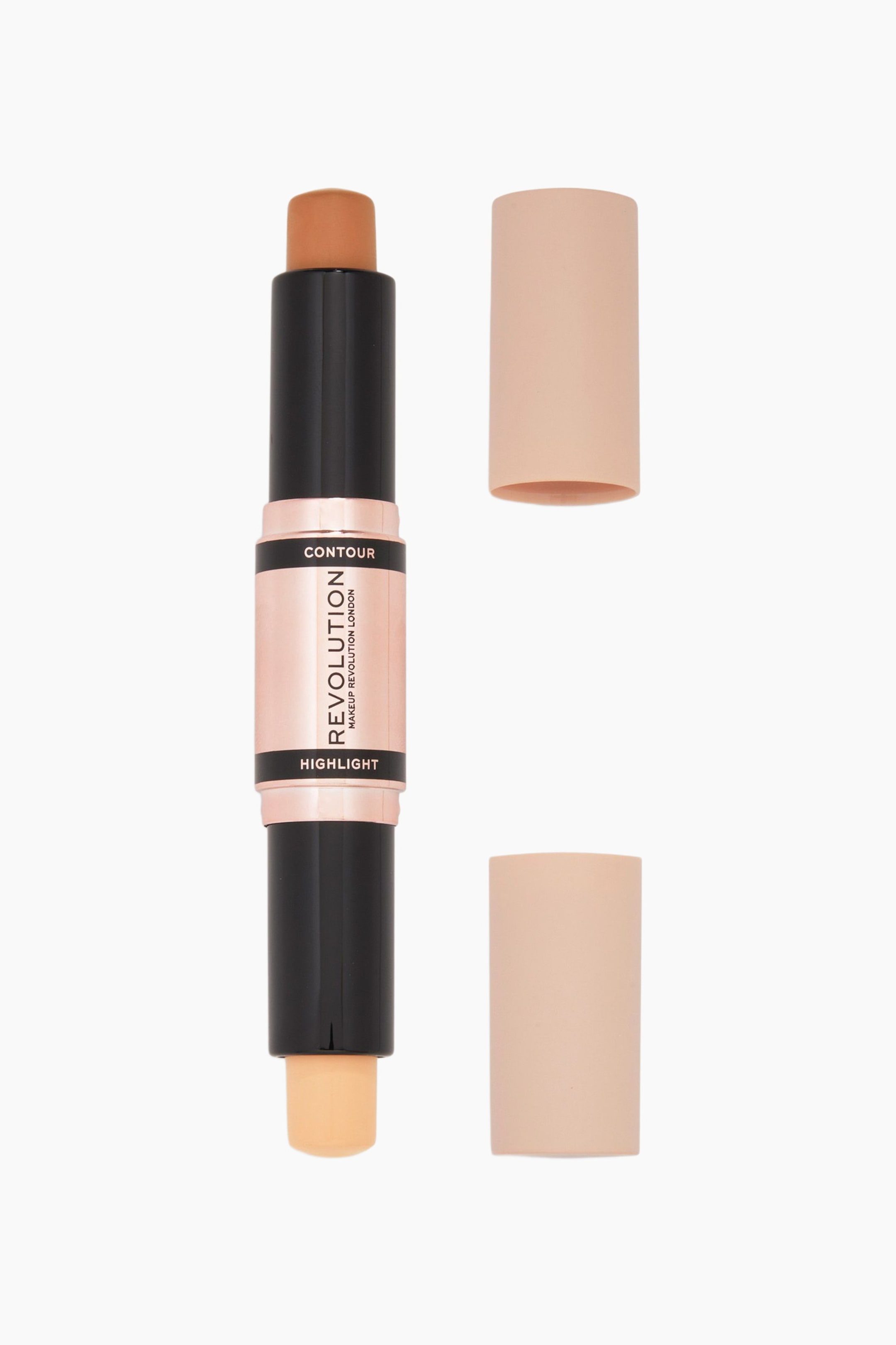 Näytä suurempi kuva: Kaksipäinen meikkipuikko seisoo pystyasennossa, ja toisessa päässä näkyy paljas ruskea contour-voide ja toisessa vaaleanbeige highlight-voide. Keskellä oleva ruusukultainen runko näyttää brändin nimen "REVOLUTION" mustilla nimetyillä renkailla, ja oikealla näkyy kaksi persikanväristä korkkia irrotettuina.