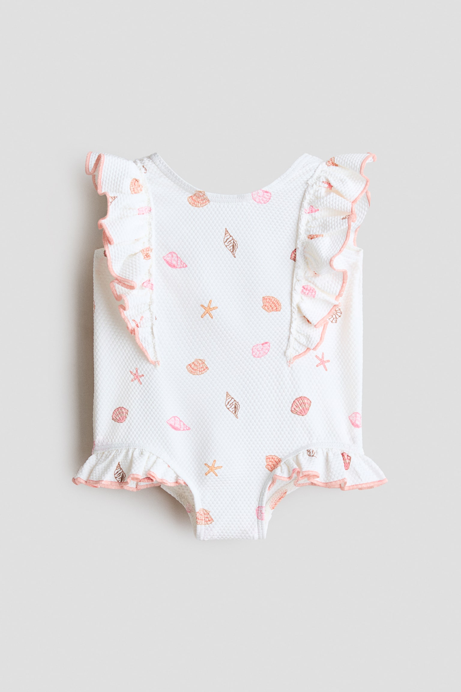 Costume intero con volant - Bianco/conchiglie/Rosa chiaro/fiori/Blu/fiori