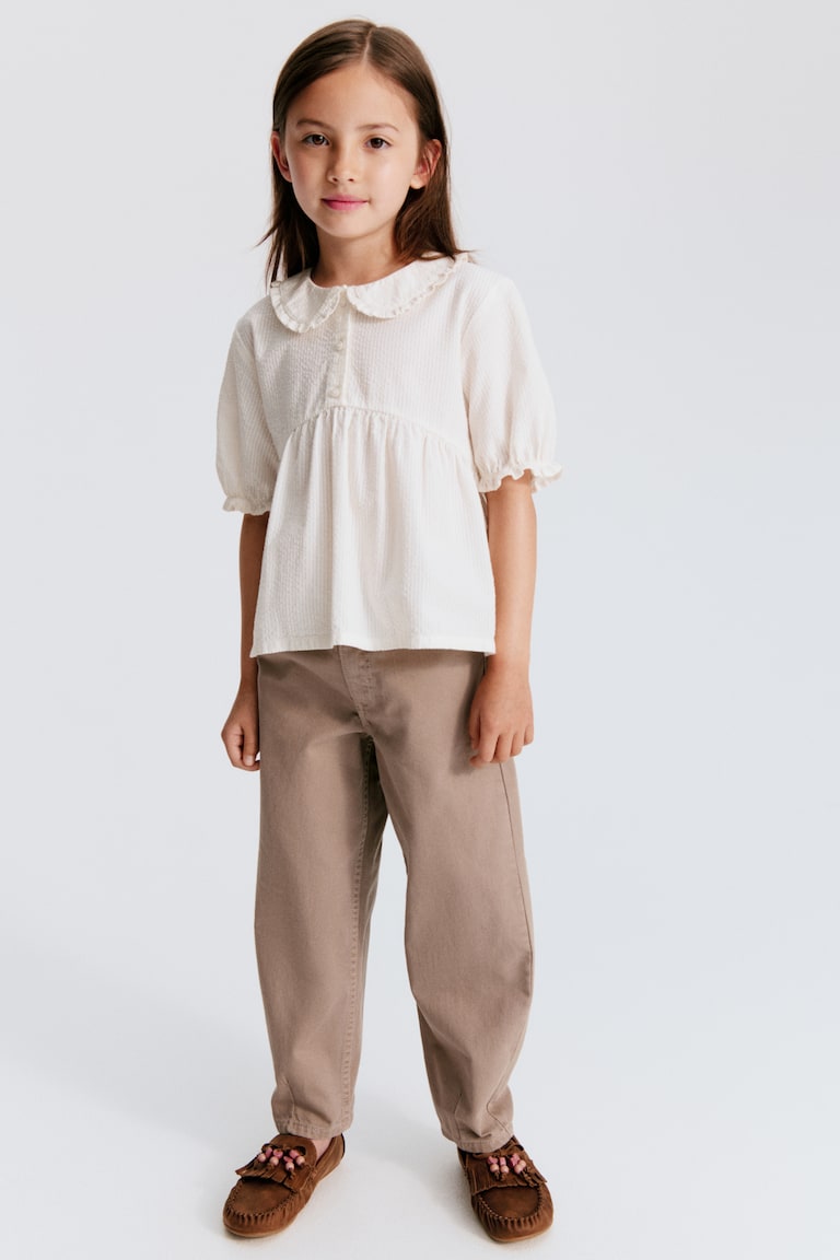 Pantalone od pamučnog kepera cilindričnog kroja