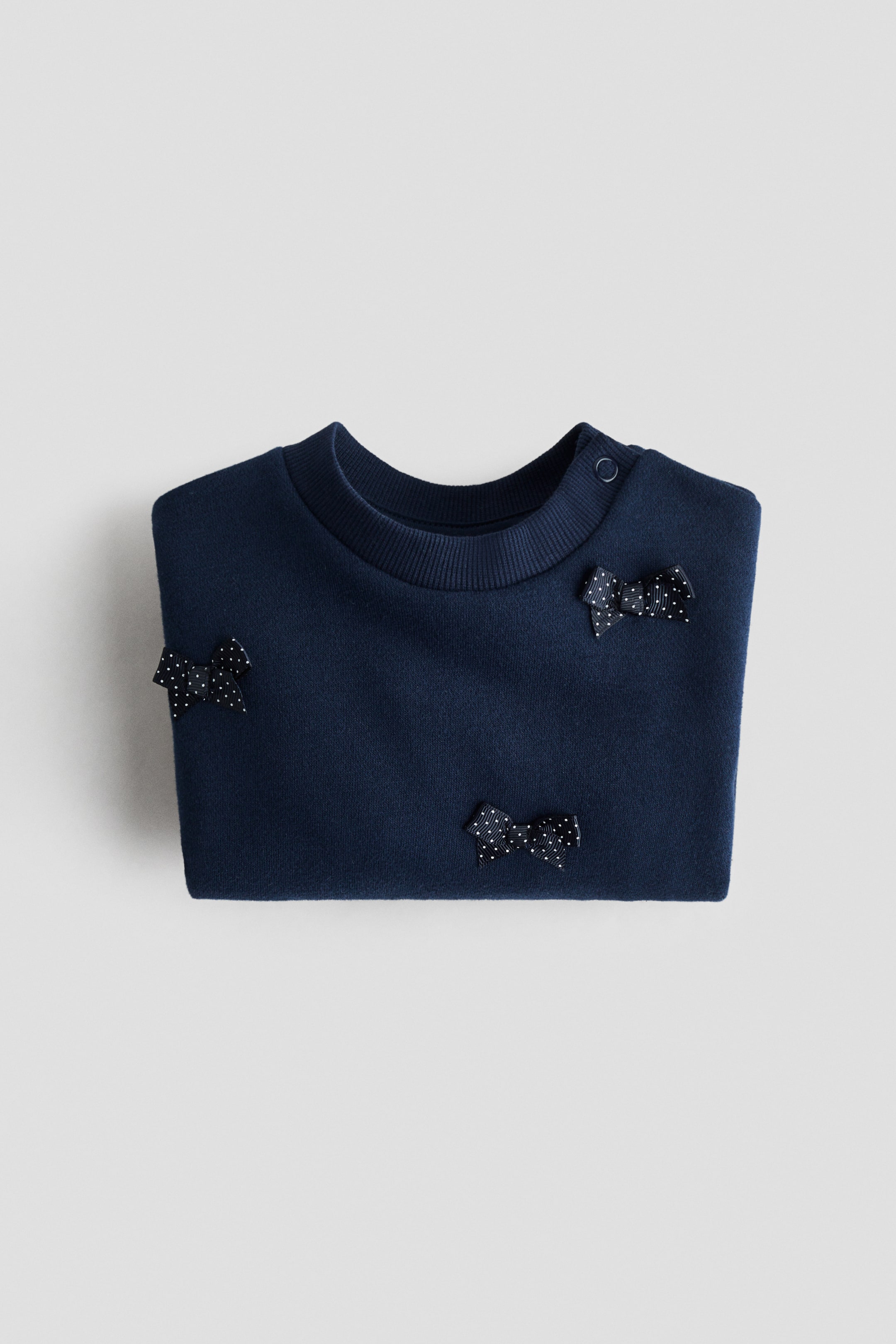 View larger image: Motif-detail sweatshirt - Navy blue/Bows - Kids | H&M IN 2