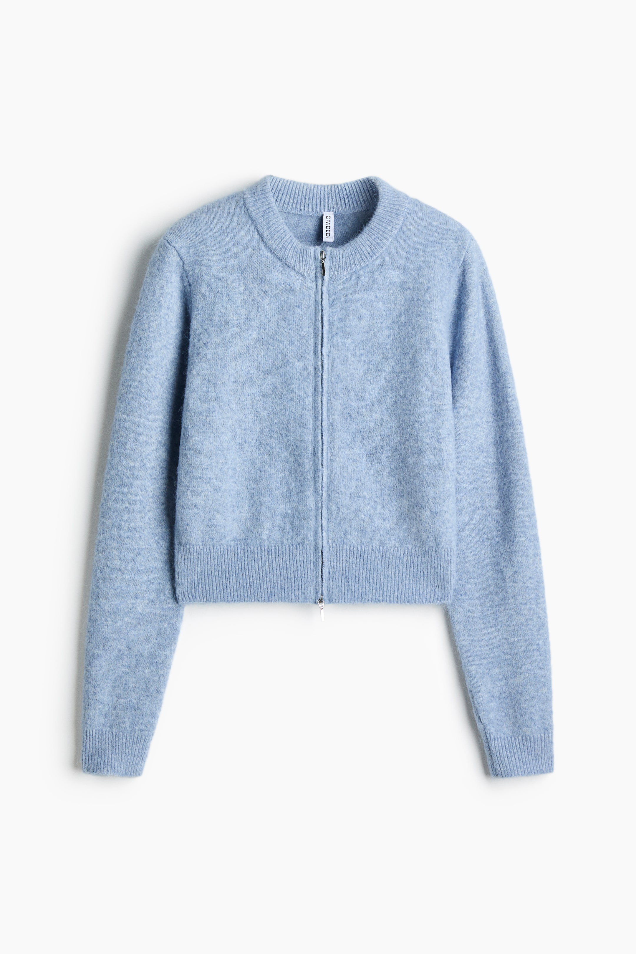 View larger image: A light blue cropped knit cardigan is shown from the front, featuring a full zip-up closure, a ribbed crew neck, ribbed cuffs, and a wide ribbed hem.