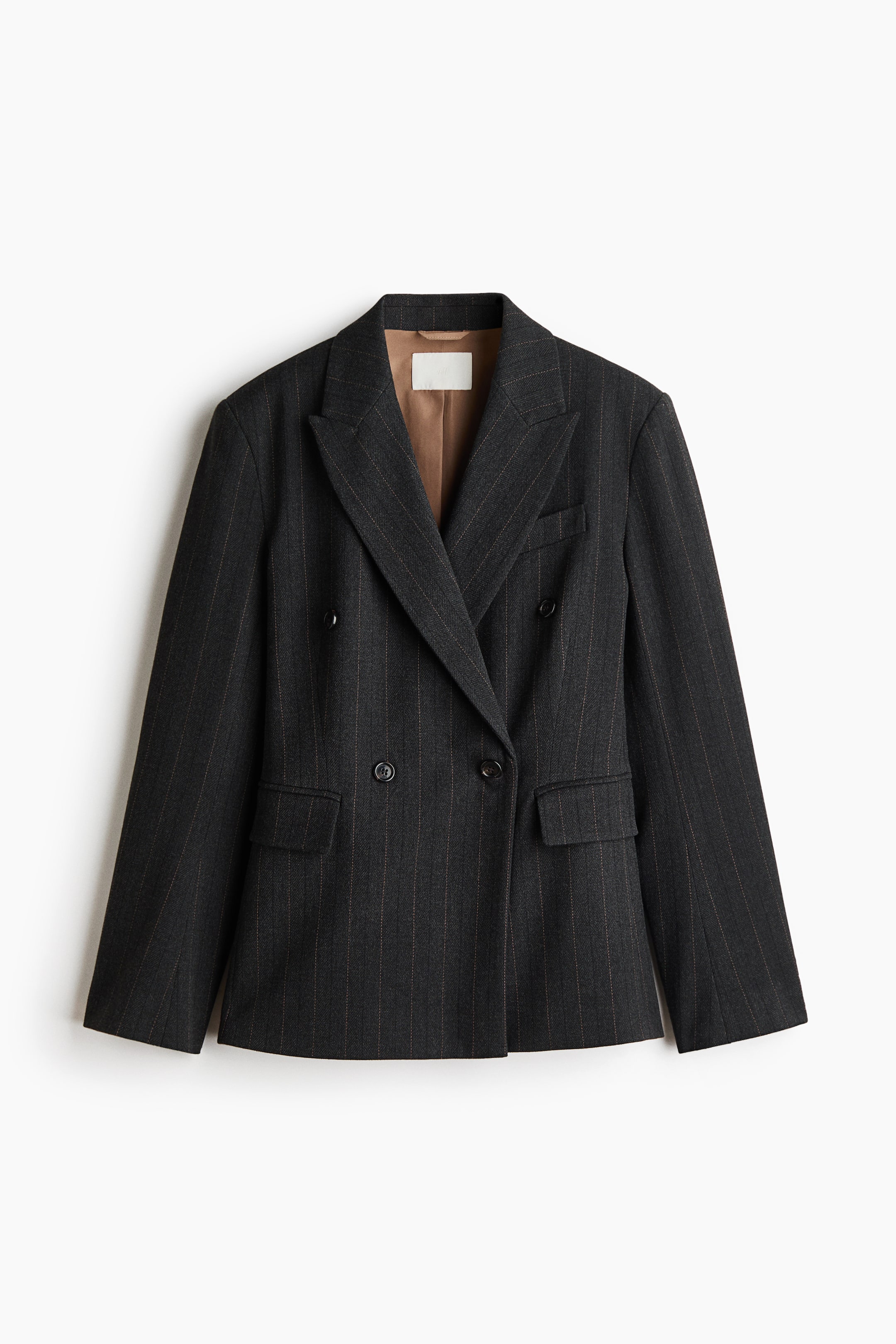 View larger image: A black double-breasted blazer is shown front-facing, featuring a subtle pinstripe pattern. It has notch lapels, four front buttons, and two flap pockets. A brown inner lining is visible at the neckline.