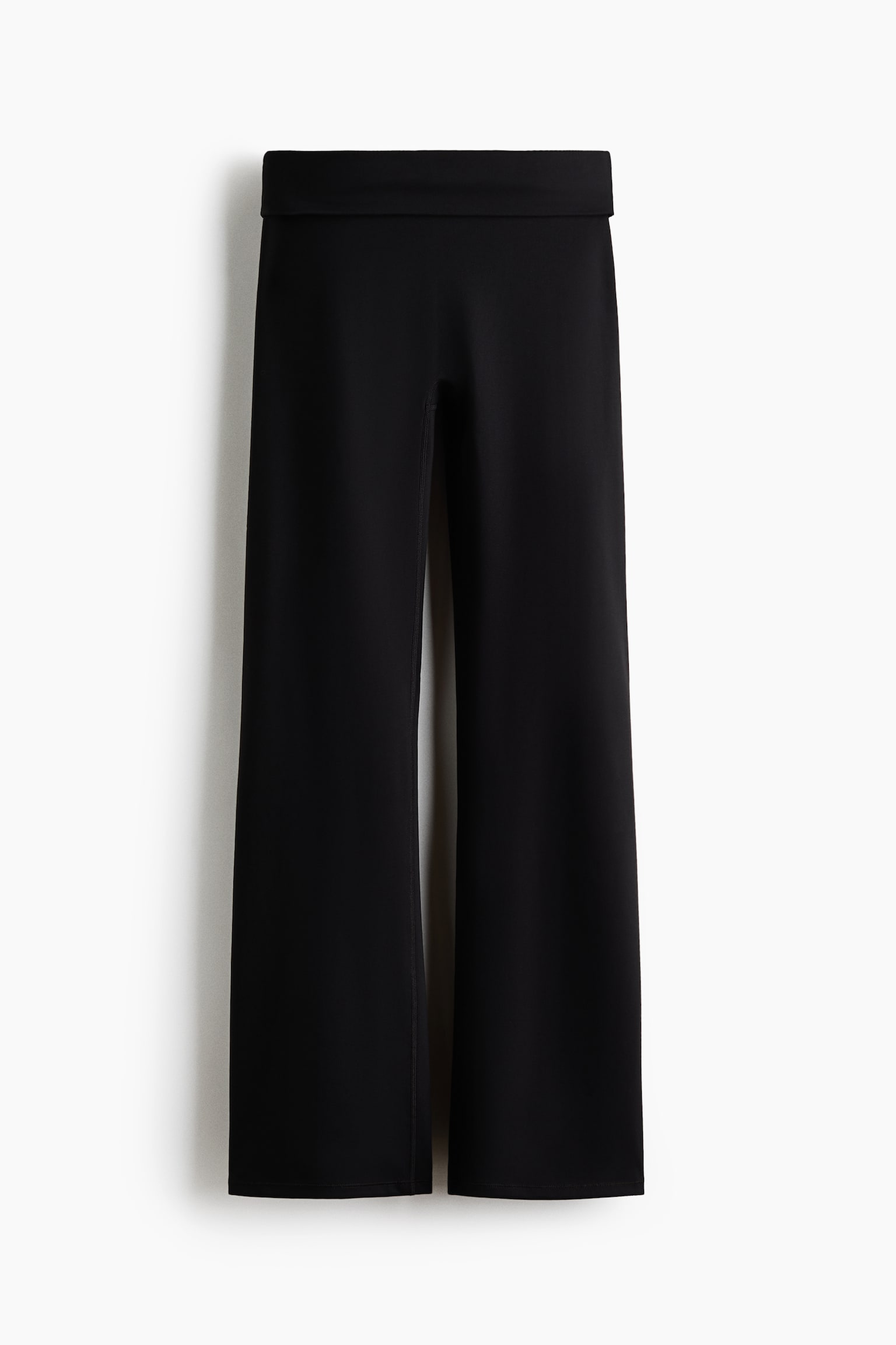 Женские леггинсы H&M Flared Yoga Leggings with SoftMove™, цвет: Чёрный — фото 1