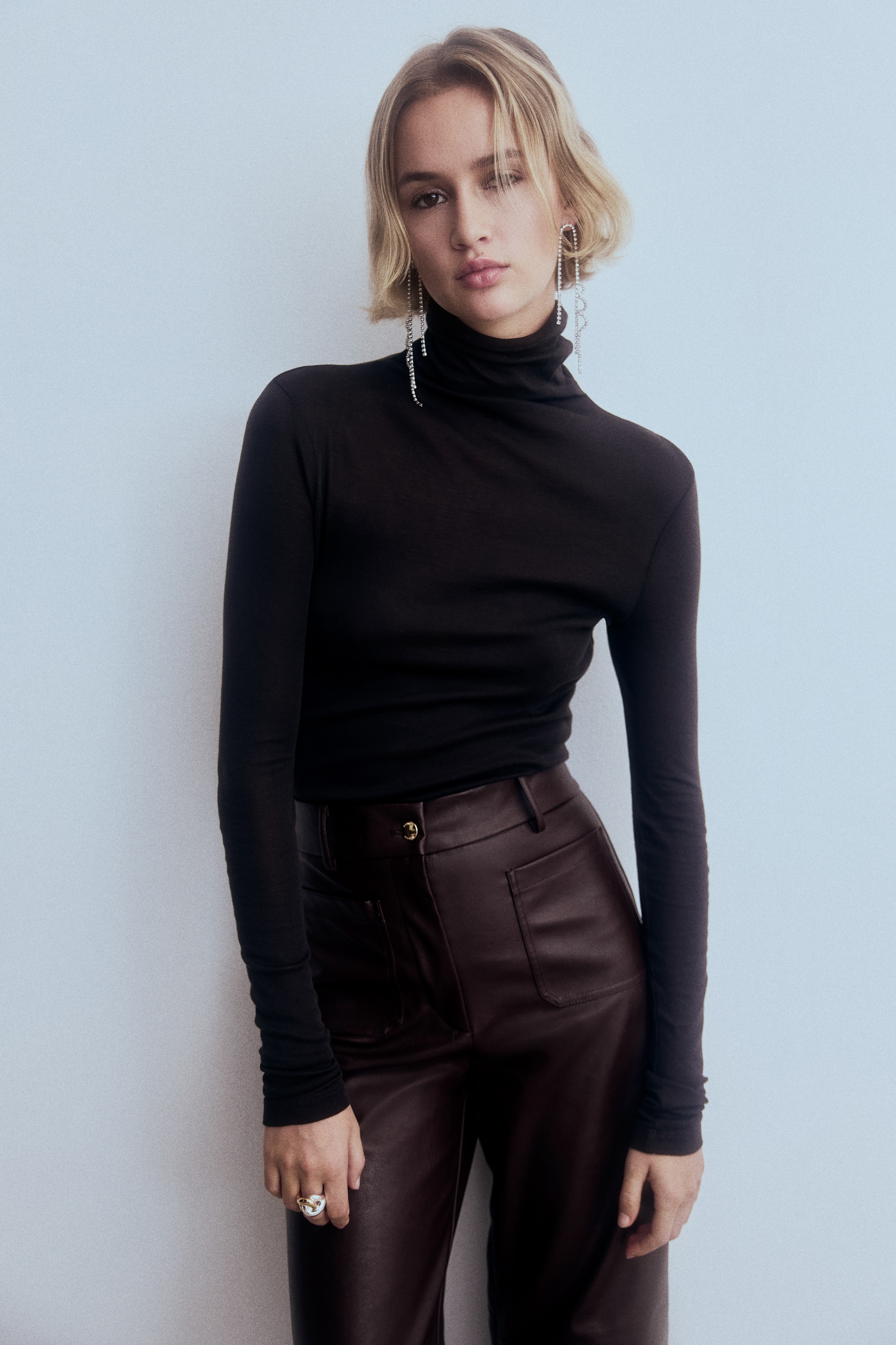 Flared coated trousers