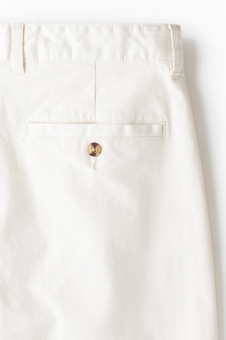 Men’s White Relaxed Fit Cotton chinos | H&M IN