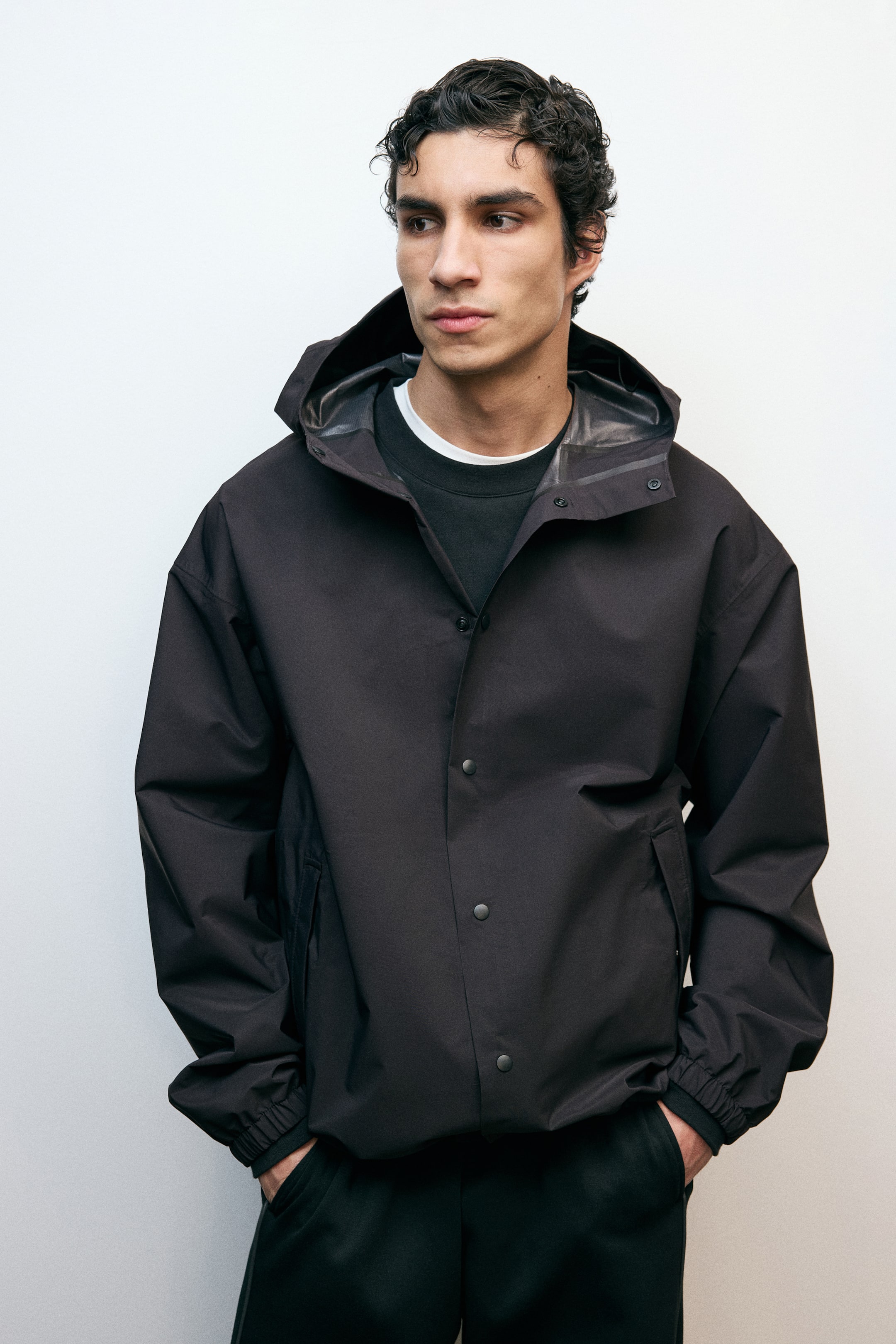 Visualizza immagine più grande: Giacca antipioggia con StormMove™ - Nero - UOMO | H&M IT 1