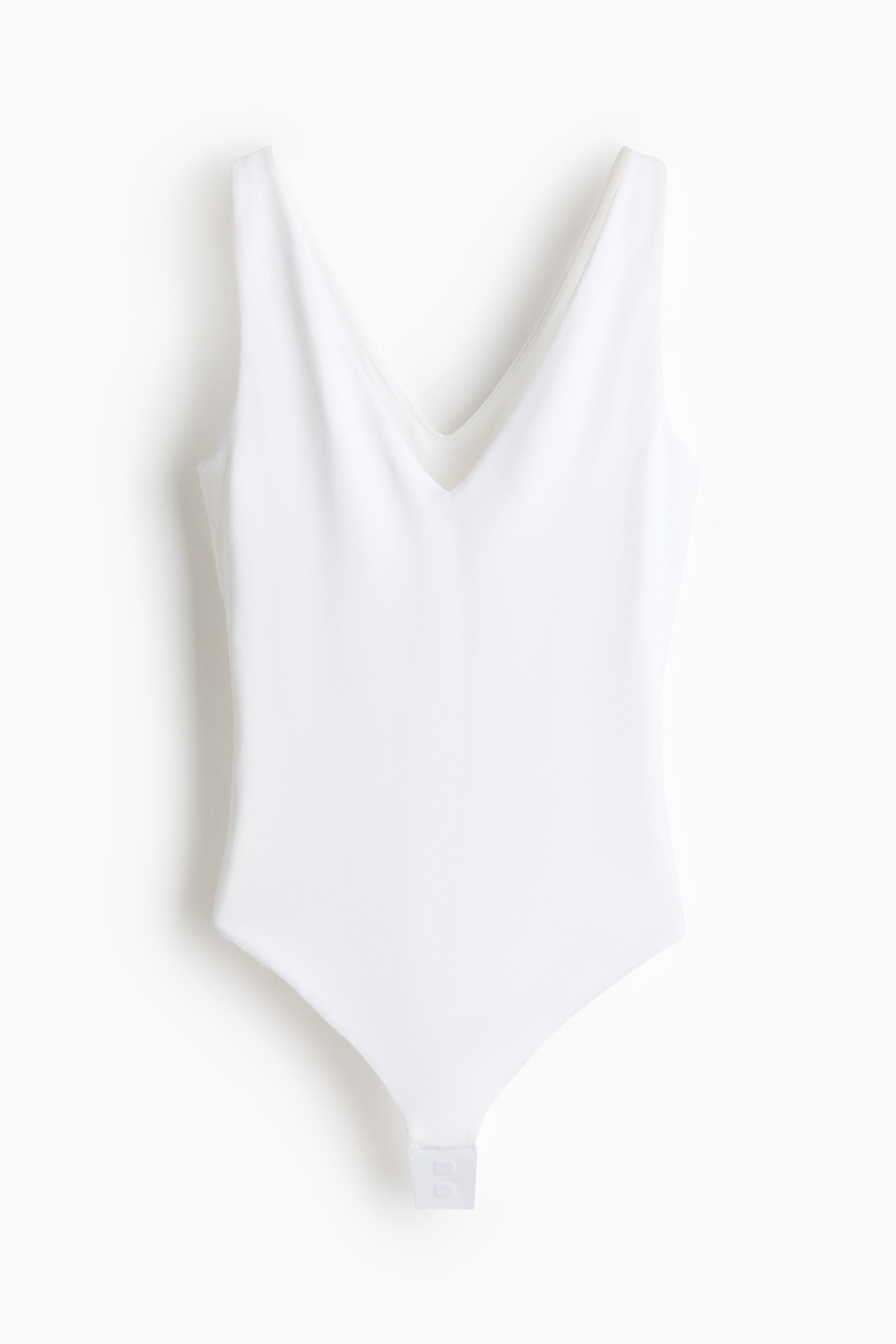 Maillot string sculptant sans manches