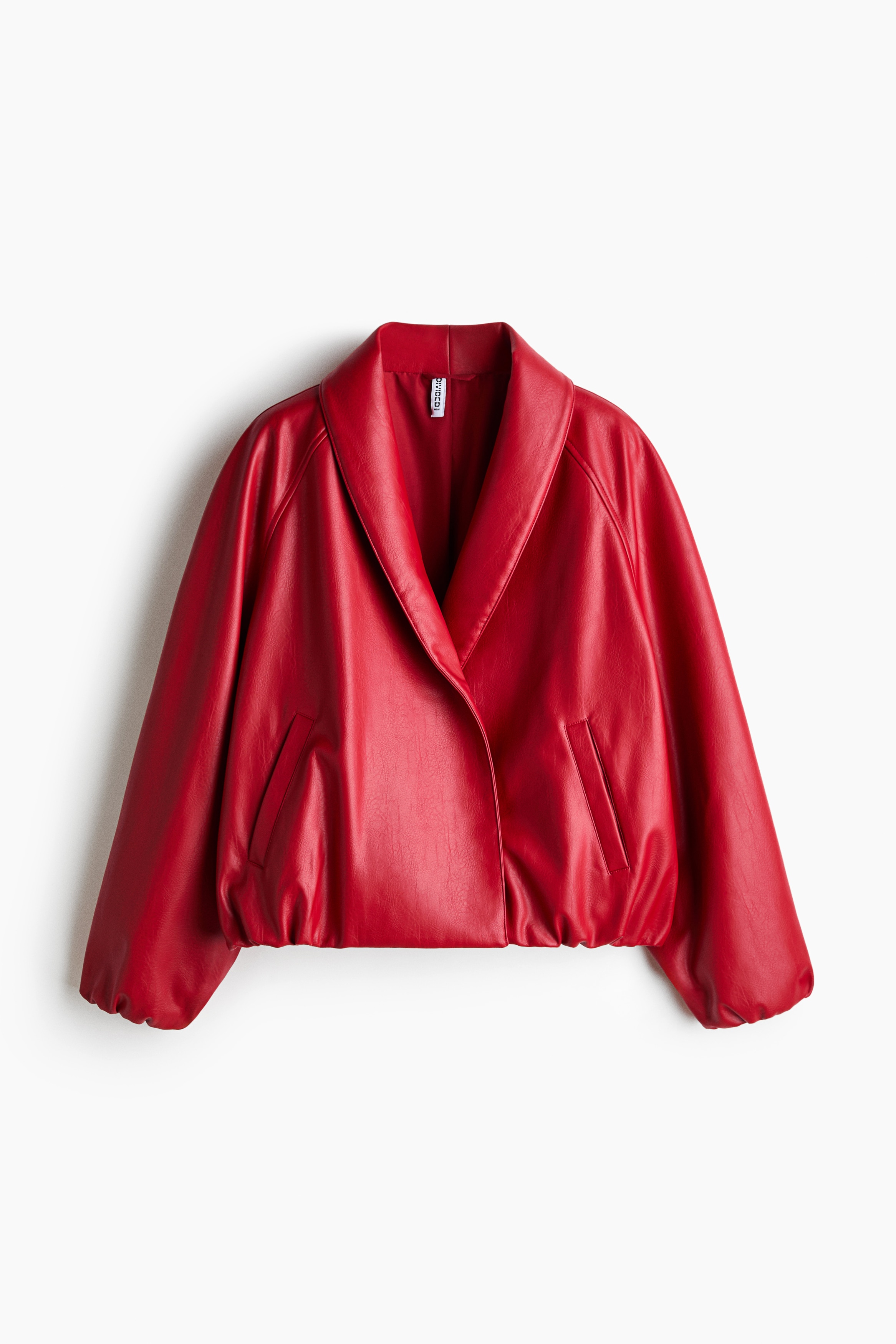 Chaqueta en tejido revestido con cuello esmoquinAuxiliar