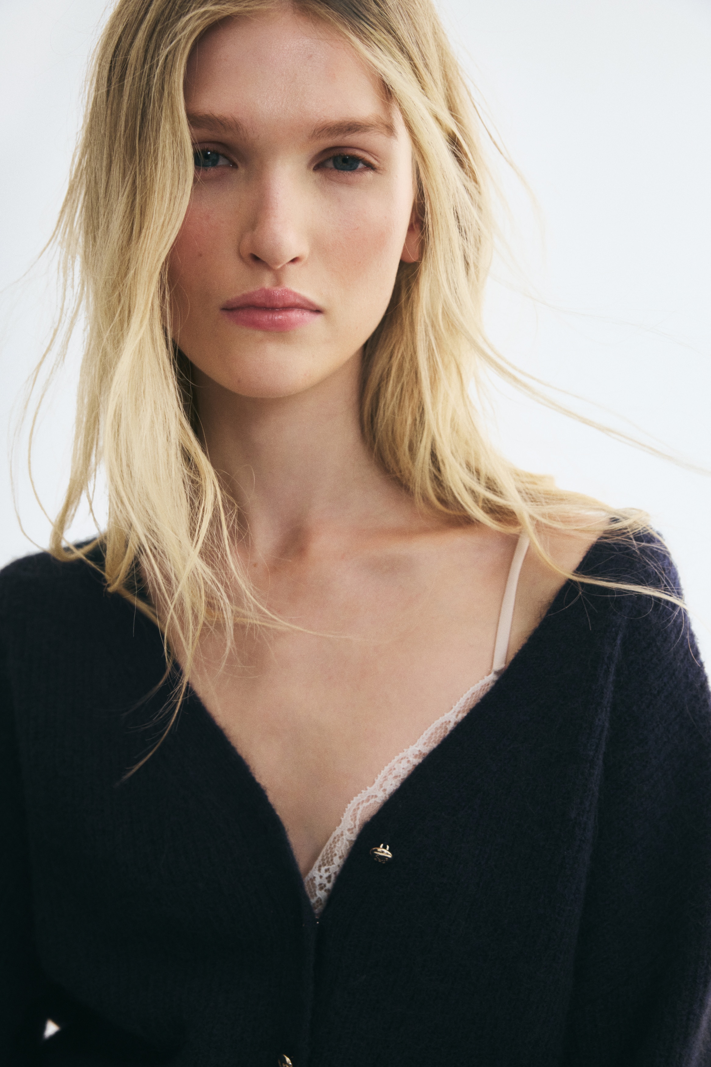 Rib-knit V-neck cardiganModel
