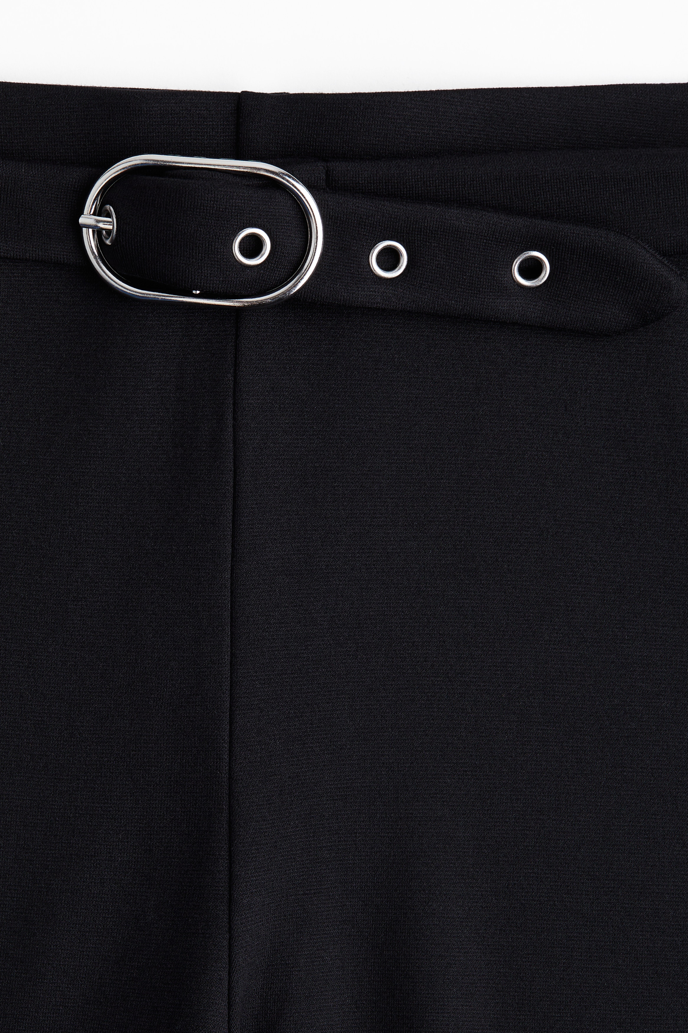 Flared belt-detail trousers