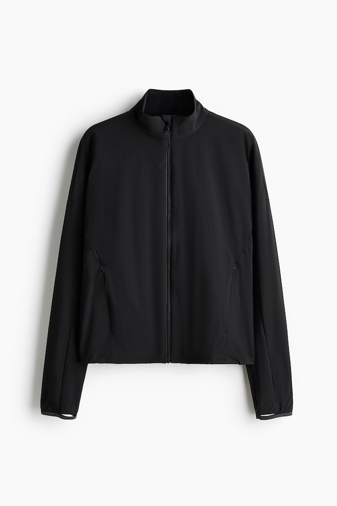 Water-repellent warming sports jacket - Black - 1