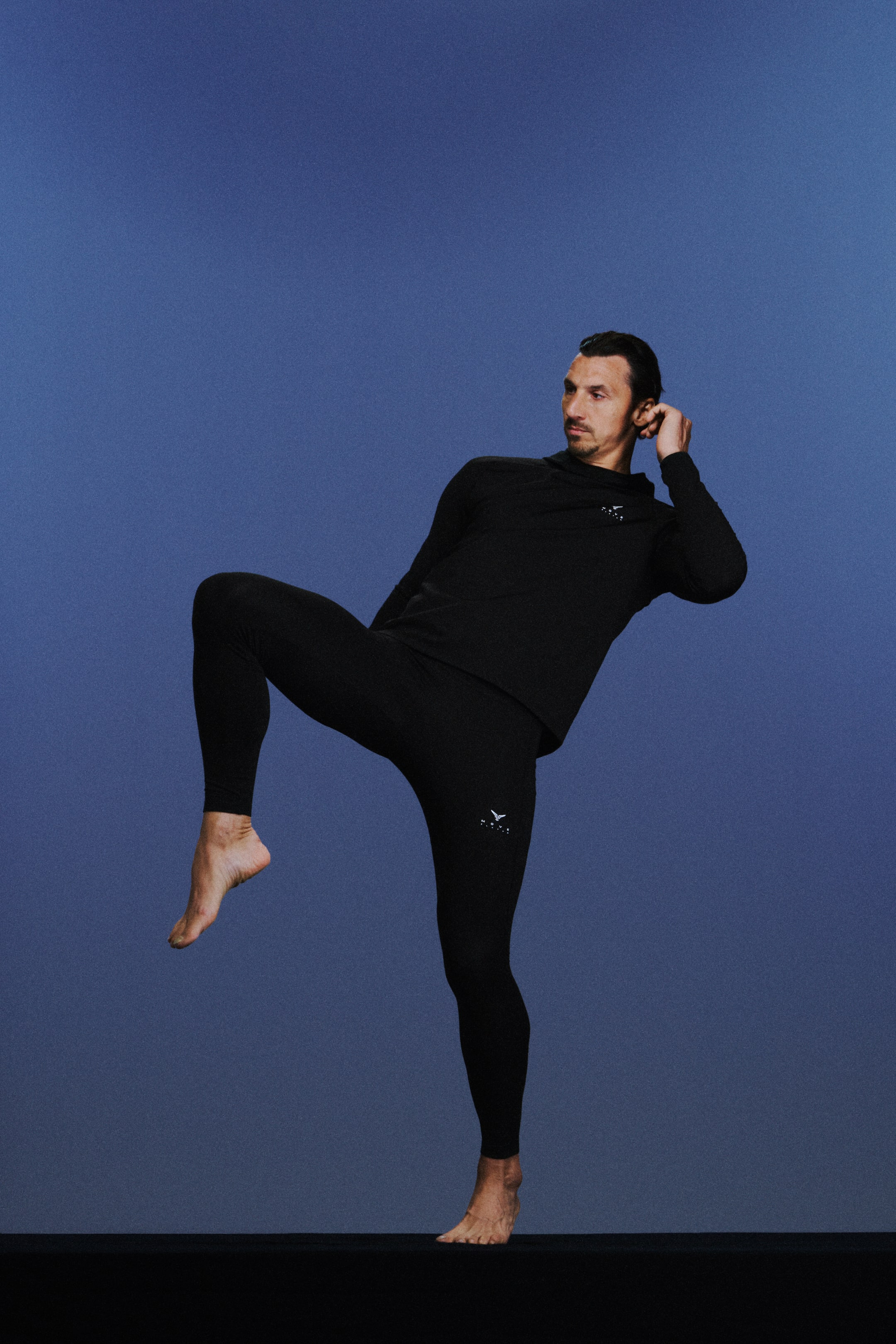 View larger image: Warming sports tights with ThermoMove™ - Black/Move Zlatan - Men | H&M IE 2
