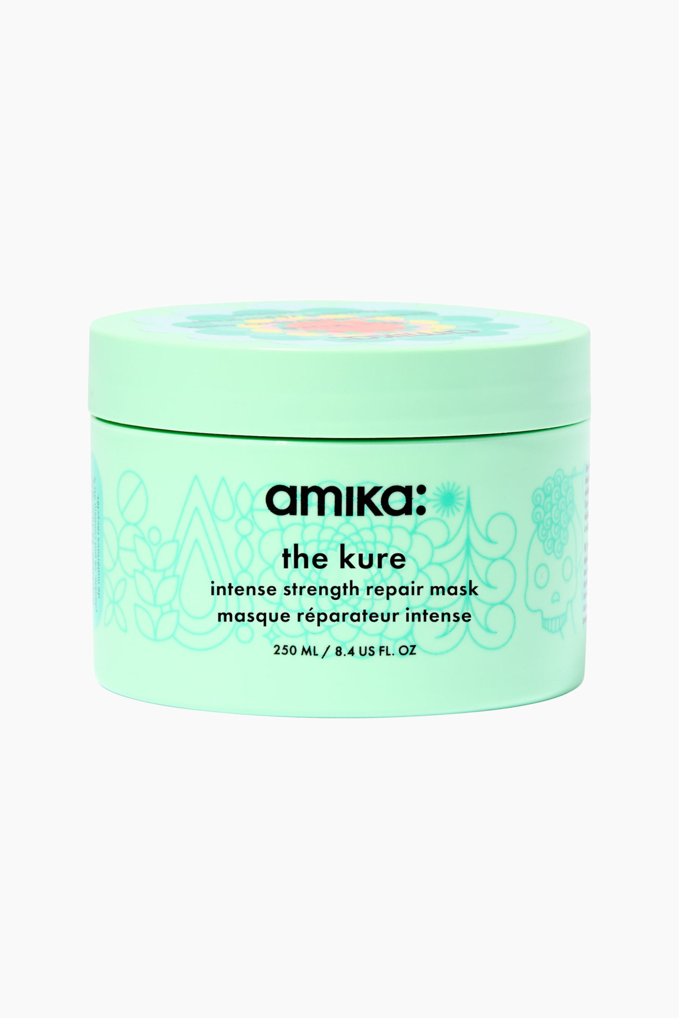 Visa större bild: En framifrån vy visar en cylindrisk, mintgrön burk av Amika "the kure" intense strength repair mask. Burken har svart tryckt text på framsidan och subtila, ton-i-ton-teal linjetecknade illustrationer runt utsidan under ett matchande skruvlock.