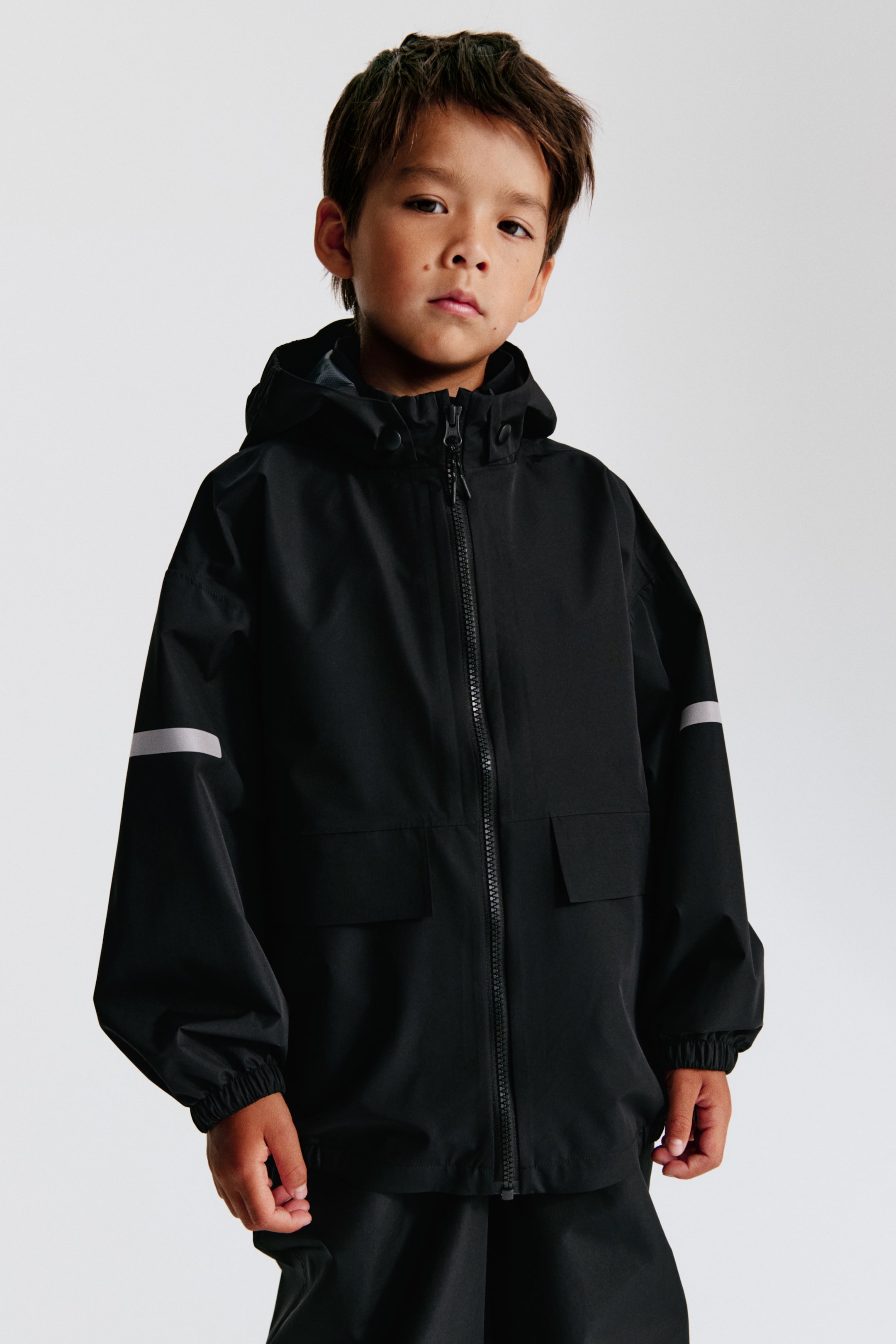 View larger image: Rain jacket - Black - Kids | H&M IN 1