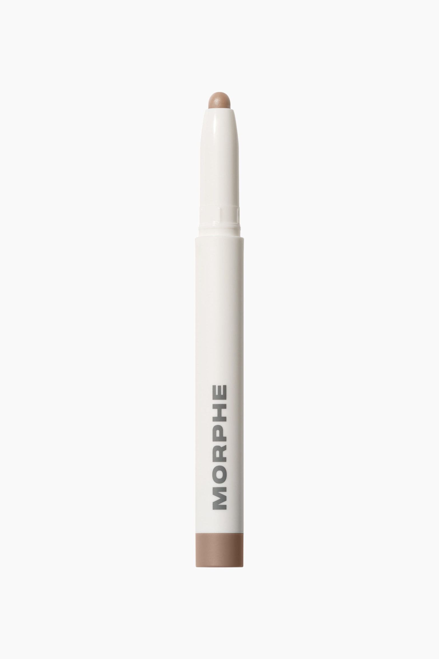 Morphe Shapelifter Micro Contour Stick seisoo pystyasennossa, ja siinÃ¤ on siro valkoinen sylinterimÃ¤inen runko, jonka kylkeen on painettu âMORPHEâ pystysuunnassa harmaalla. Tikun ylÃ¤osassa nÃ¤kyy paljas, pyÃ¶reÃ¤ vaaleanruskea kremÃ¤tippi, kun taas alaosassa on sÃ¤vyyn sopiva vaaleanruskea rengas.