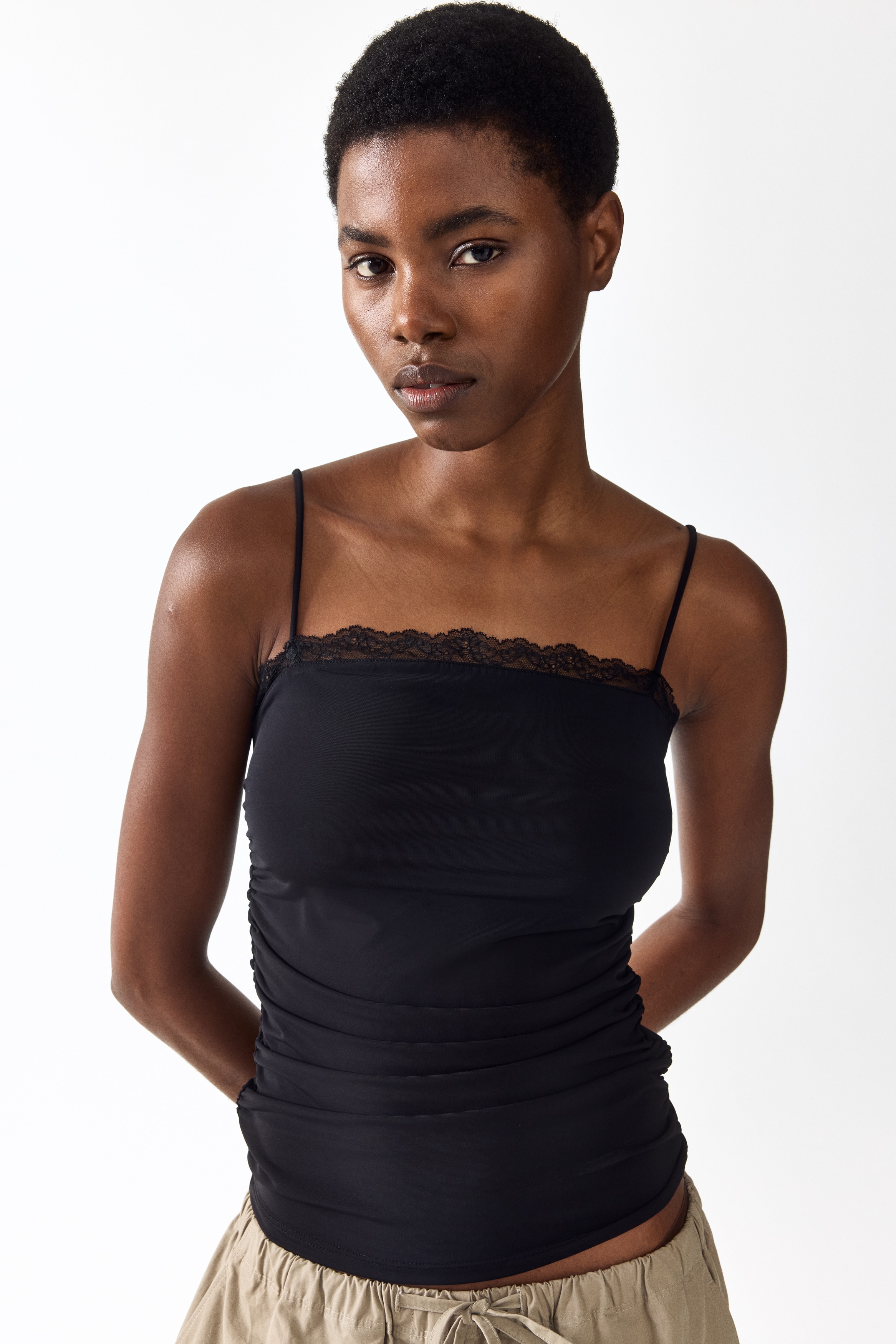 Lace-trimmed strappy top