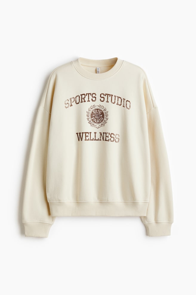Sweatshirt mit Motiv - Hellbeige/Wellness/Hellbeige/Hôtel de Luxe/Dunkelgrau/Paris - 1